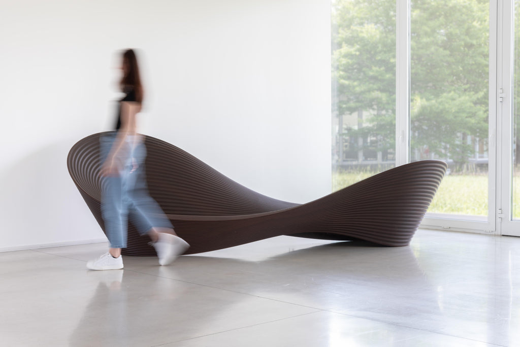 https://a.1stdibscdn.com/magis-folly-bench-sofa-ron-arad-rotational-moulded-polyethylene-outdoor-for-sale-picture-7/f_105752/f_474300421762542433607/Magis_folly_bench_ambient_SD18_brown_04_hr_master.jpg