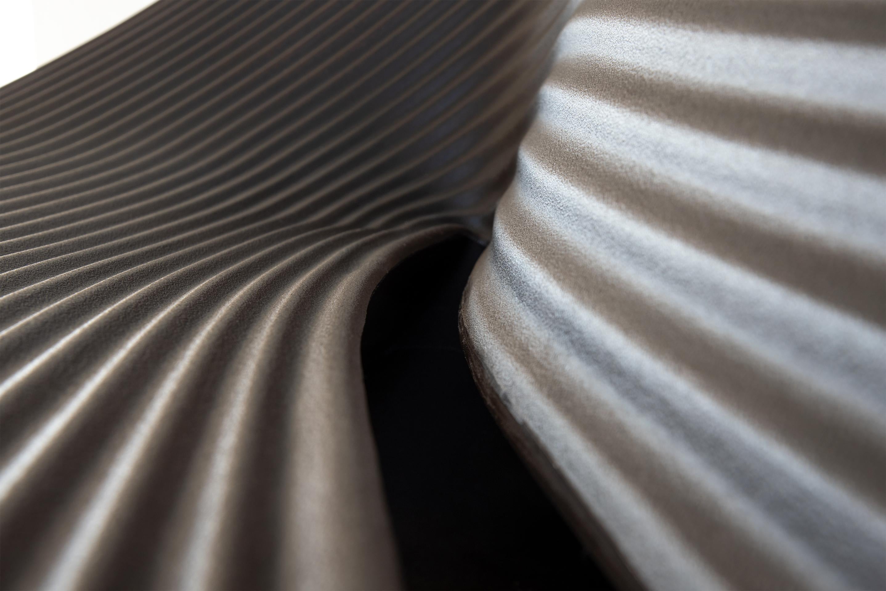 https://a.1stdibscdn.com/folly-bench-by-ron-arad-for-magis-for-sale-picture-7/f_16392/f_364311021696292525329/Magis_folly_bench_ambient_detail_SD18_brown_01_hr_master.jpg