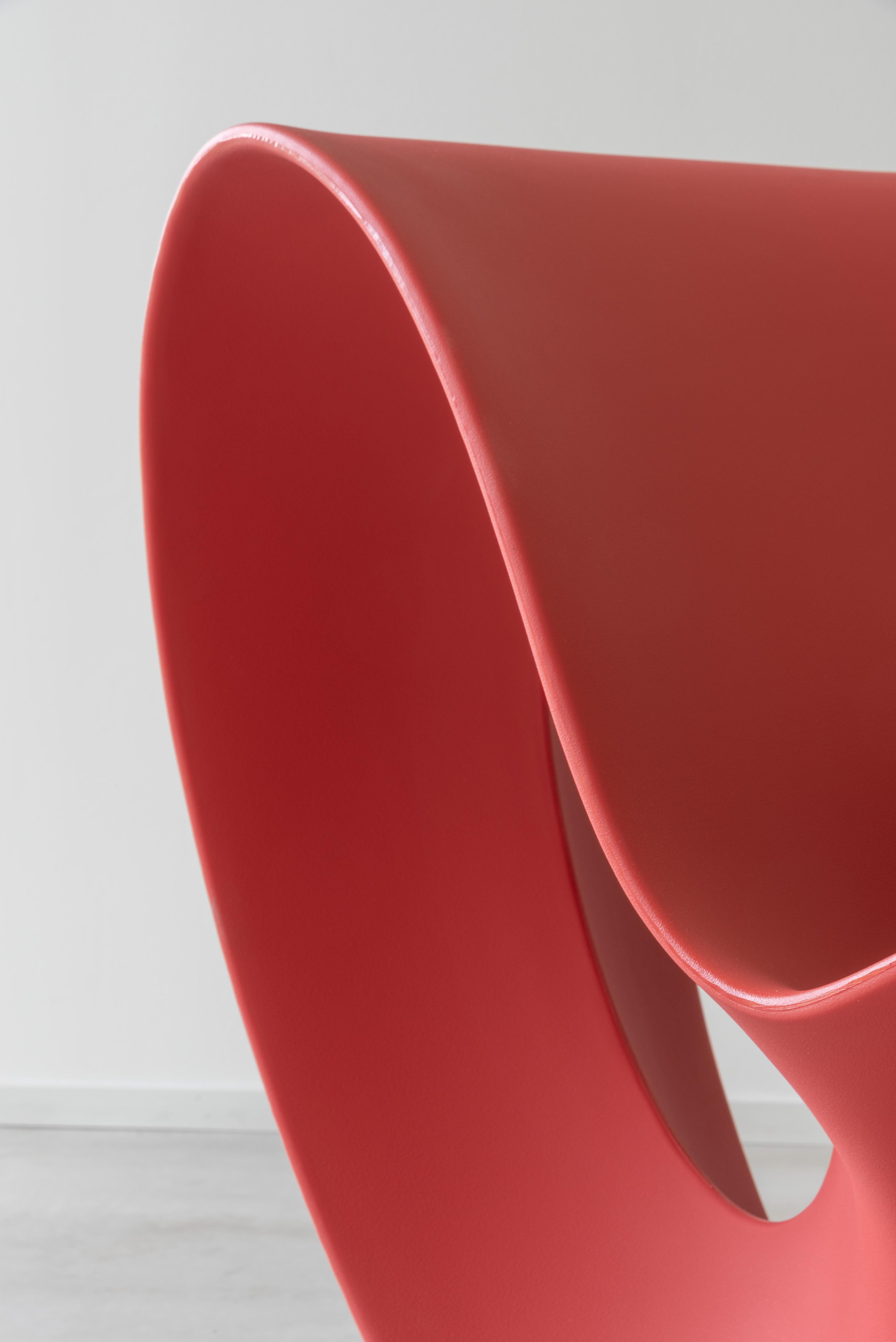 https://a.1stdibscdn.com/voido-rocking-chair-in-red-by-ron-arad-for-magis-for-sale-picture-6/f_16392/f_364015521696085359899/Magis_voido_rocking_chair_ambient_detail_SD12_orange_05_hr_master.jpg