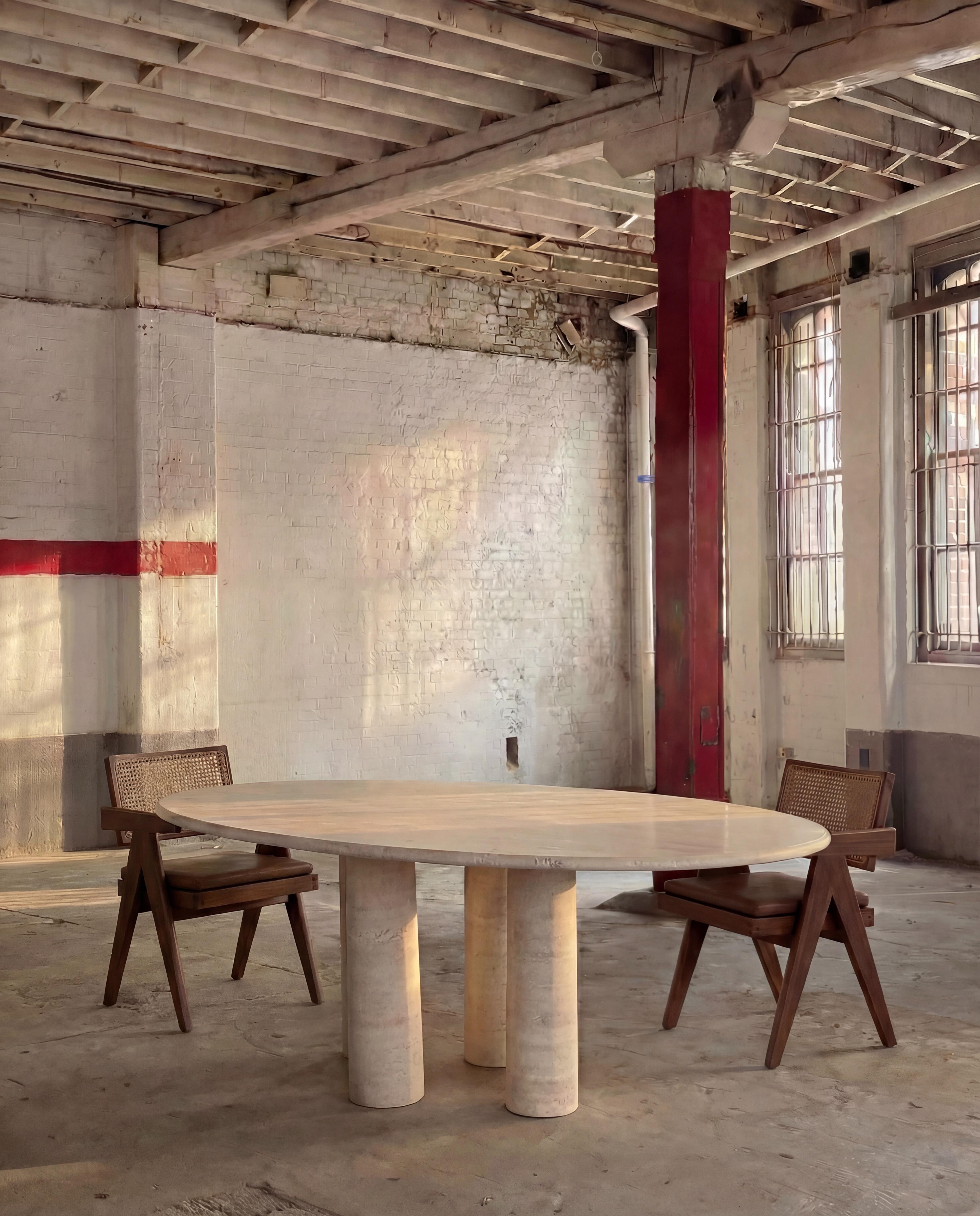 https://a.1stdibscdn.com/made-to-order-filled-travertine-oval-dining-table-in-the-style-of-mario-bellini-for-sale-picture-2/f_80522/f_495340921775330870506/Mario_Oval_Filled_Travertine__master.jpeg