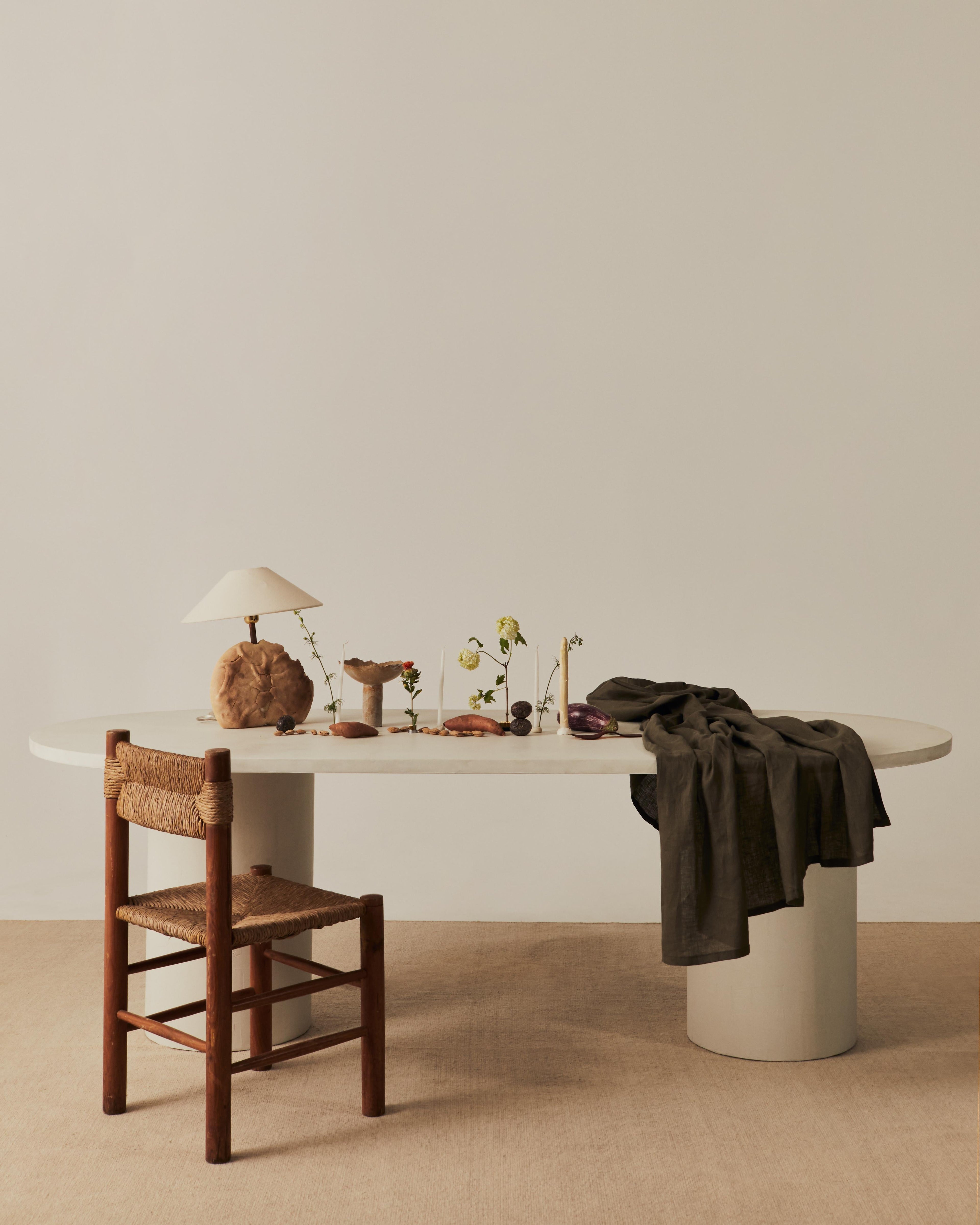 https://a.1stdibscdn.com/reye-microcement-dining-table-by-marlot-baus-for-sale-picture-2/f_106442/f_469050221759477172891/MarlotBaus_SS23_1197_master.jpg