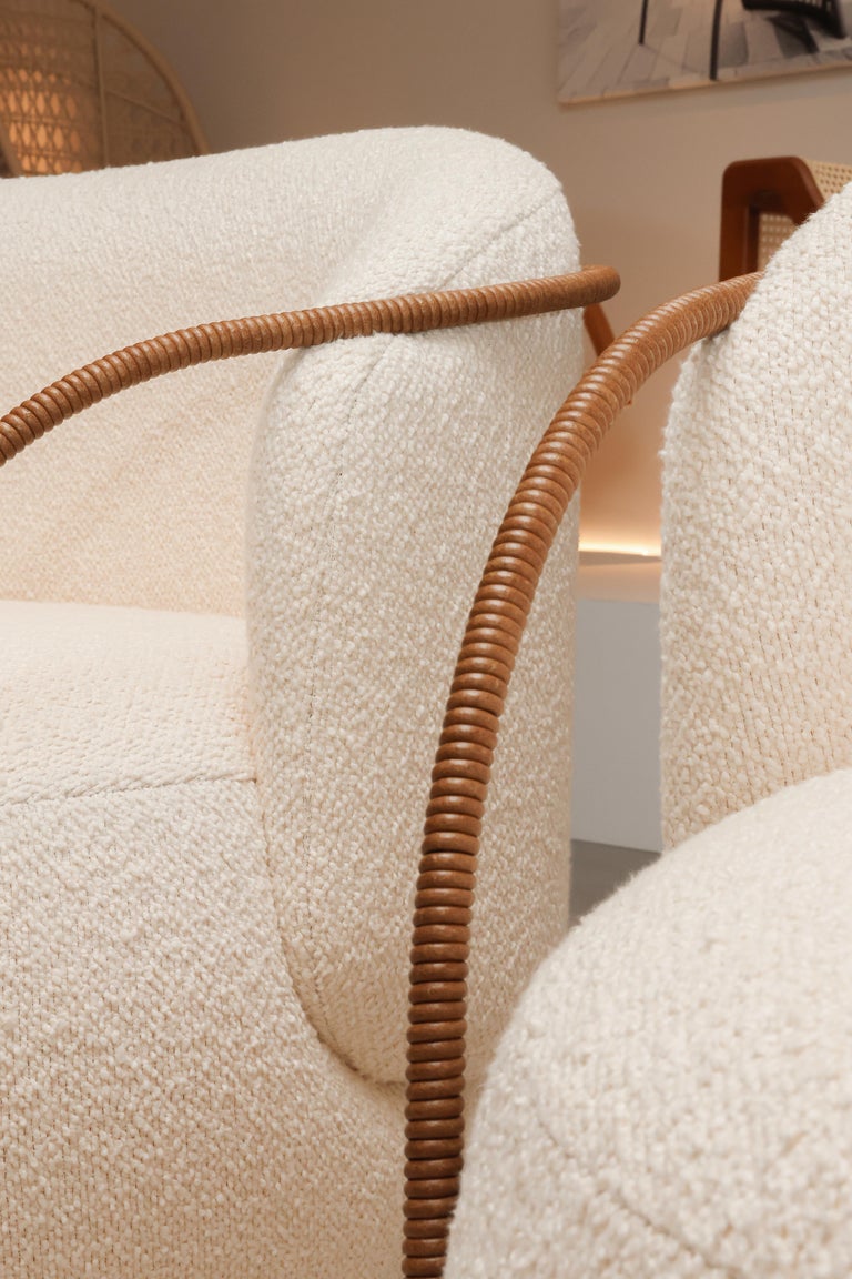 https://a.1stdibscdn.com/pietra-curved-couch-upholstered-in-boucle-fabric-and-leather-arms-22m-for-sale-picture-20/f_56842/f_397725521768912577332/Marta_Manente_7753_master.jpg?width=768
