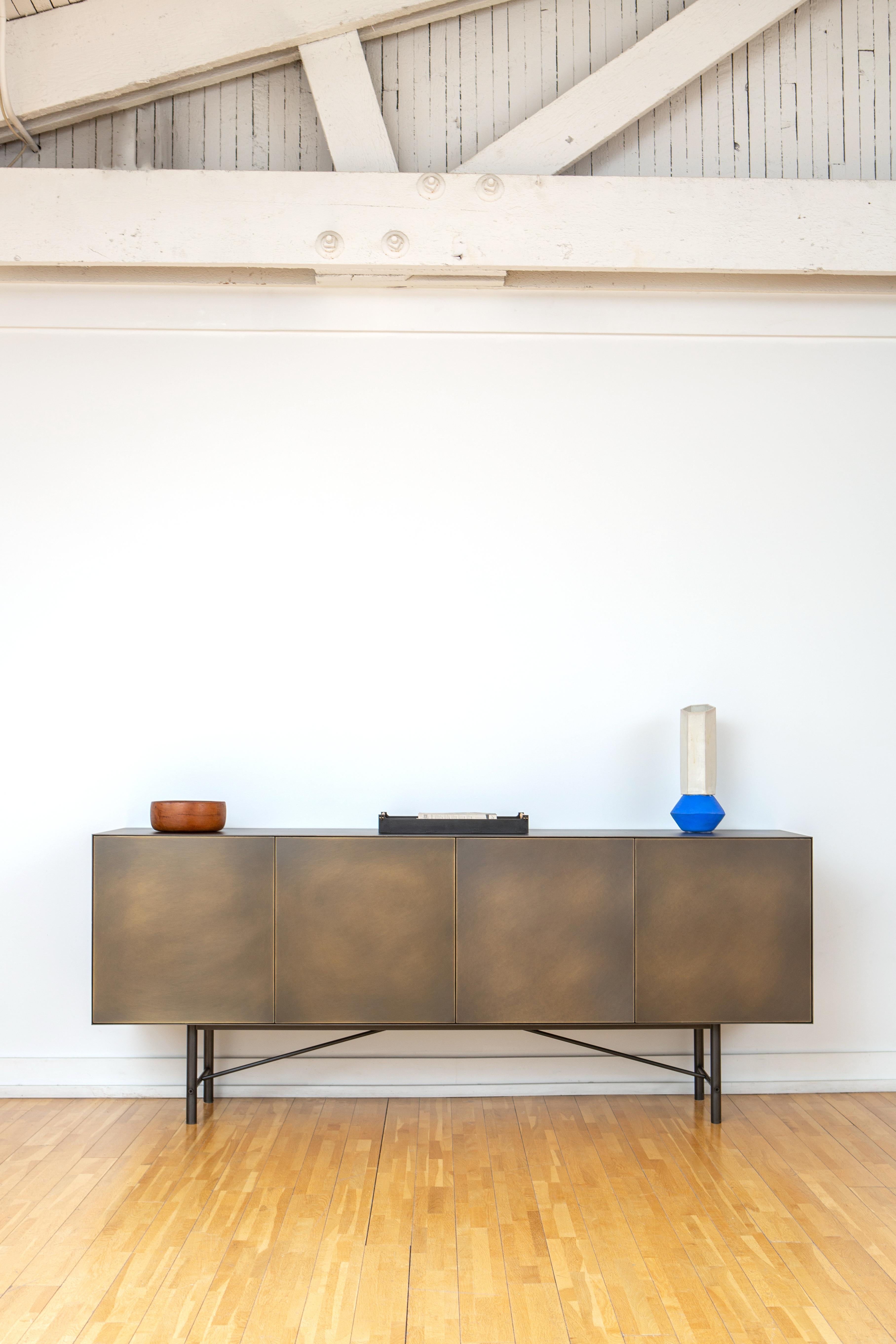https://a.1stdibscdn.com/connect-credenza-cabinet-or-sideboard-customizable-in-steel-and-aged-brass-for-sale-picture-2/f_30783/f_192863521590788257863/May25_Plano_372_Edit_master.jpg