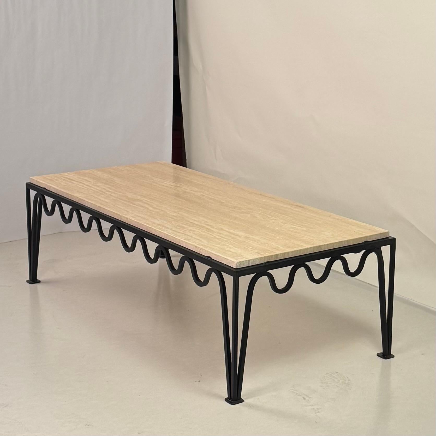 https://a.1stdibscdn.com/chic-meandre-travertine-coffee-table-by-design-freres-for-sale-picture-4/f_8184/f_474711921762803056016/Meandre_Coffee_Table_3_master.jpg