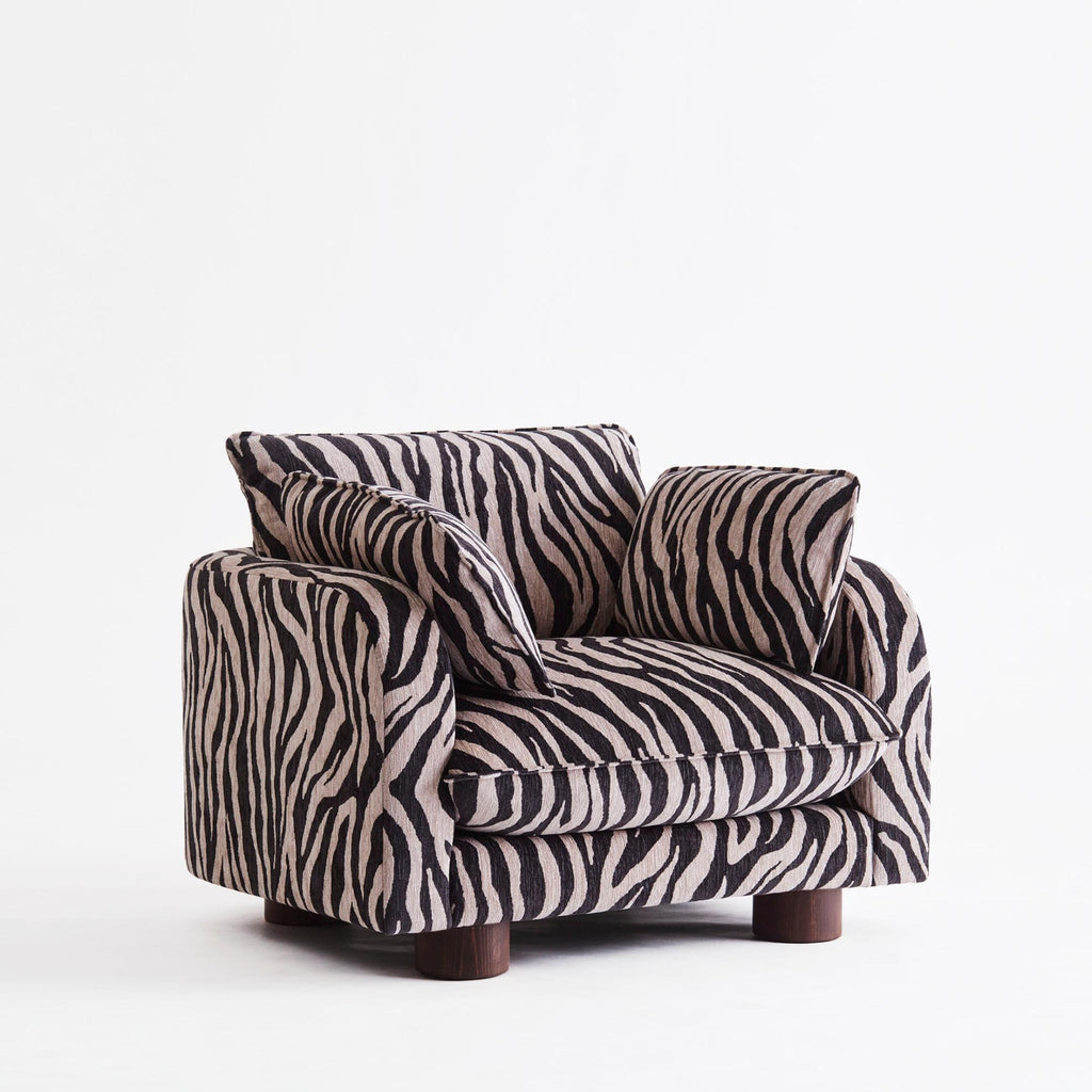 https://a.1stdibscdn.com/zebra-patterned-upholstered-armchair-model-miles-for-sale-picture-6/f_58912/f_488333421771268169820/Miles_Armchair_Zebra_side_master.jpg