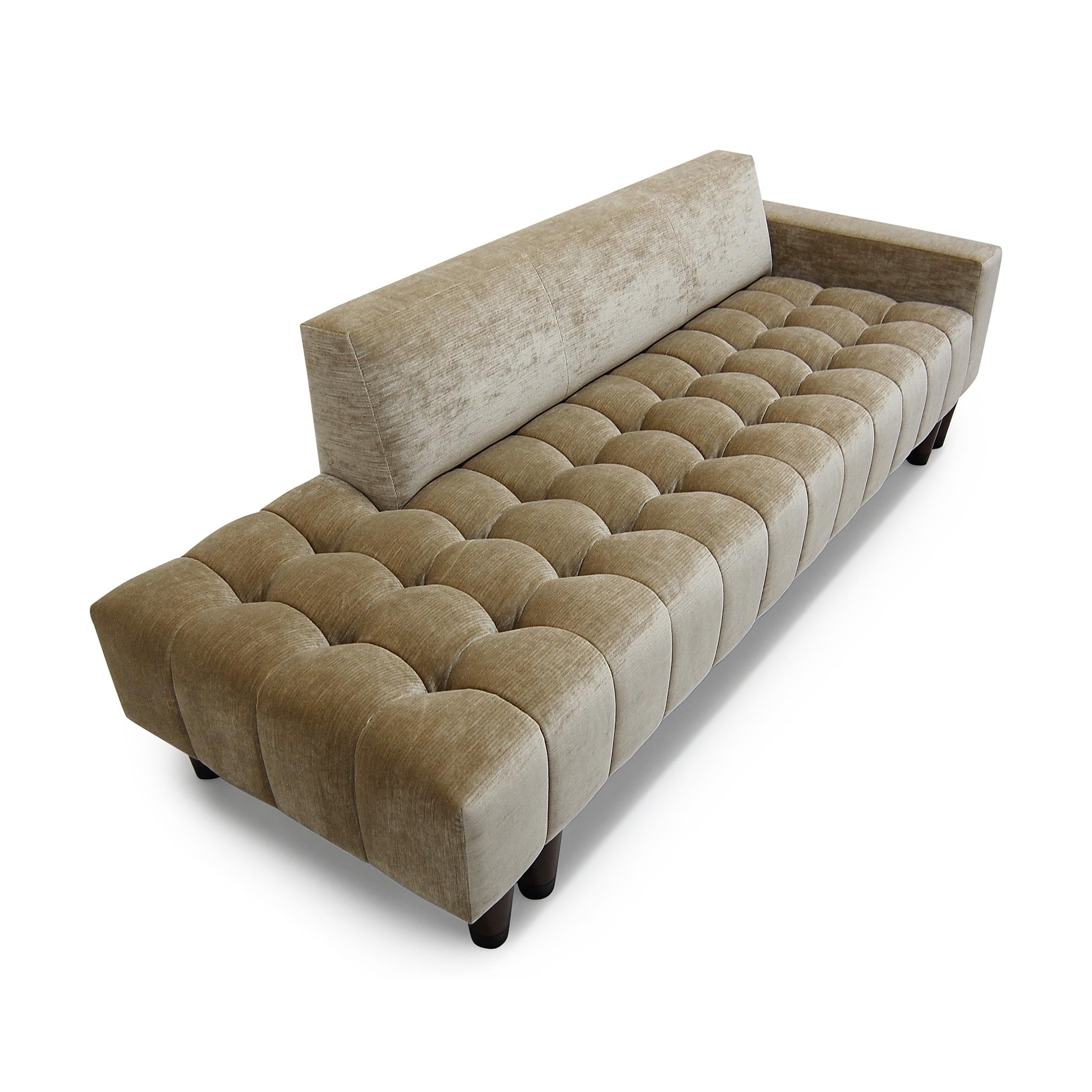 https://a.1stdibscdn.com/mini-abyss-sofa-channeling-deep-tufted-on-seat-turned-wood-legs-custom-for-sale-picture-3/f_31463/f_459982521753370379729/Mini_Abyss_Sofa_Turned_Wood_Legs_4__master.jpg