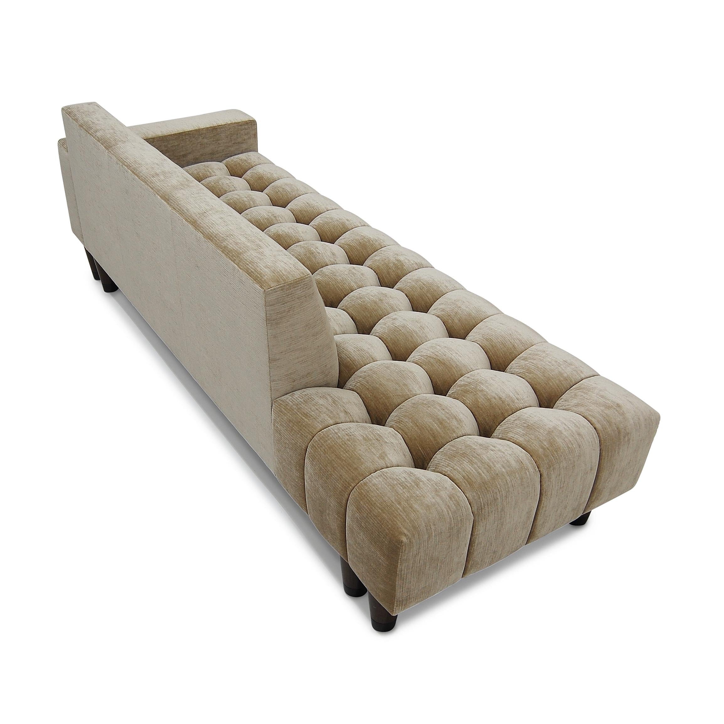https://a.1stdibscdn.com/mini-abyss-sofa-channeling-deep-tufted-on-seat-turned-wood-legs-custom-for-sale-picture-5/f_31463/f_459982521753370380860/Mini_Abyss_Sofa_Turned_Wood_Legs_7__master.jpg