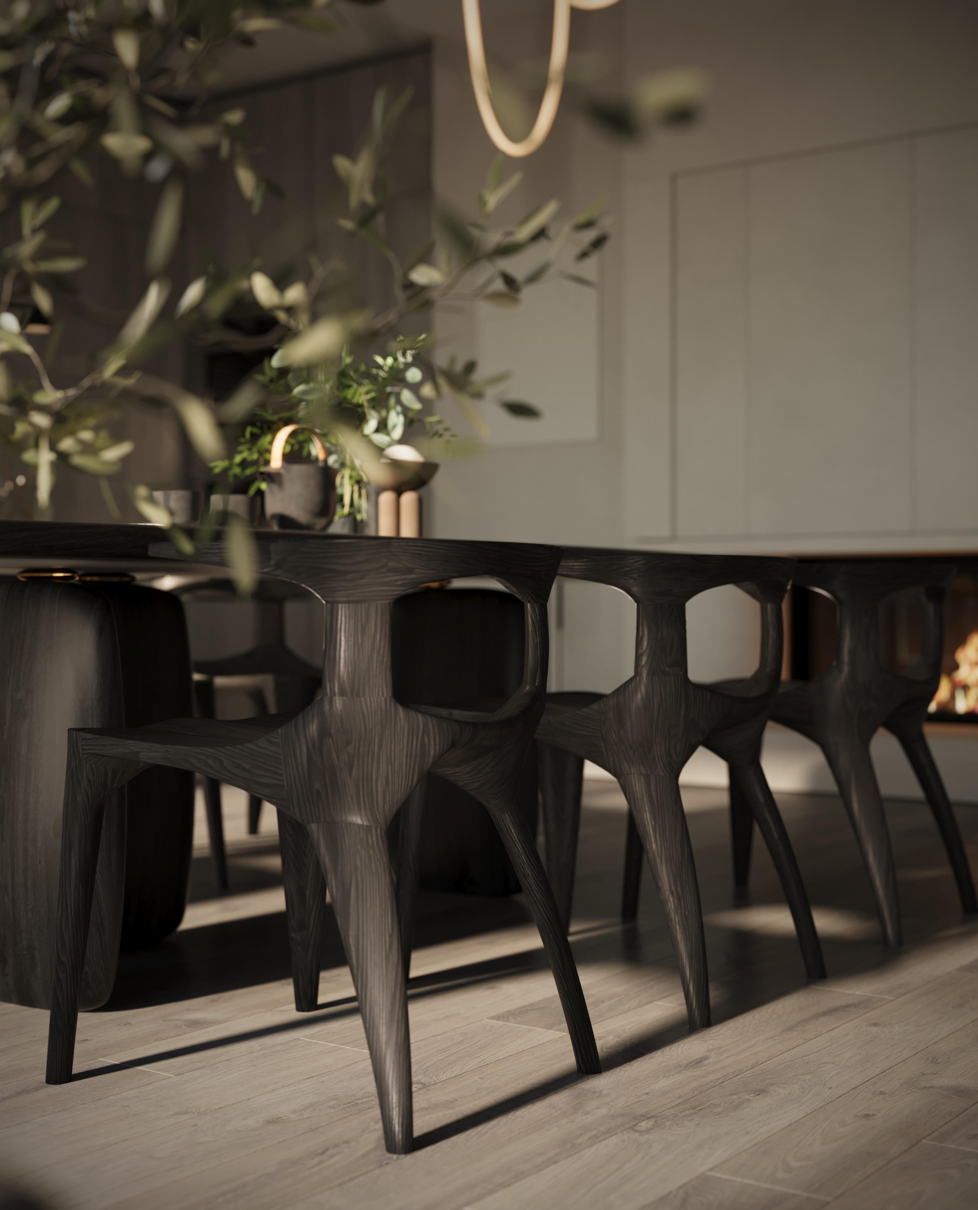 https://a.1stdibscdn.com/sculptural-solid-wood-mammut-chair-by-mobius-objects-for-sale-picture-3/f_51472/f_375495421702488451764/Mobius_Dining_Room_CloseUp_3_master.jpg