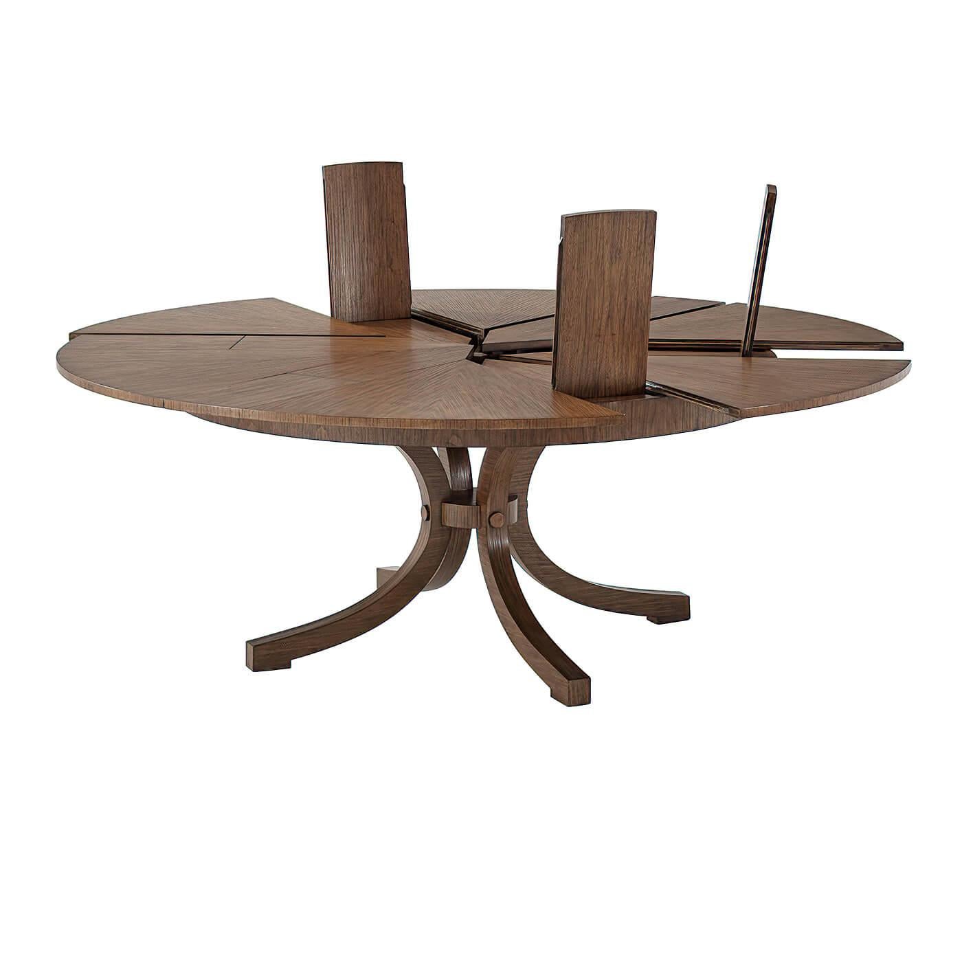 https://a.1stdibscdn.com/modern-round-extension-dining-table-for-sale-picture-2/f_8038/f_254837421632769050440/Modern_Round_Extension_Dining_Table_2_master.jpg