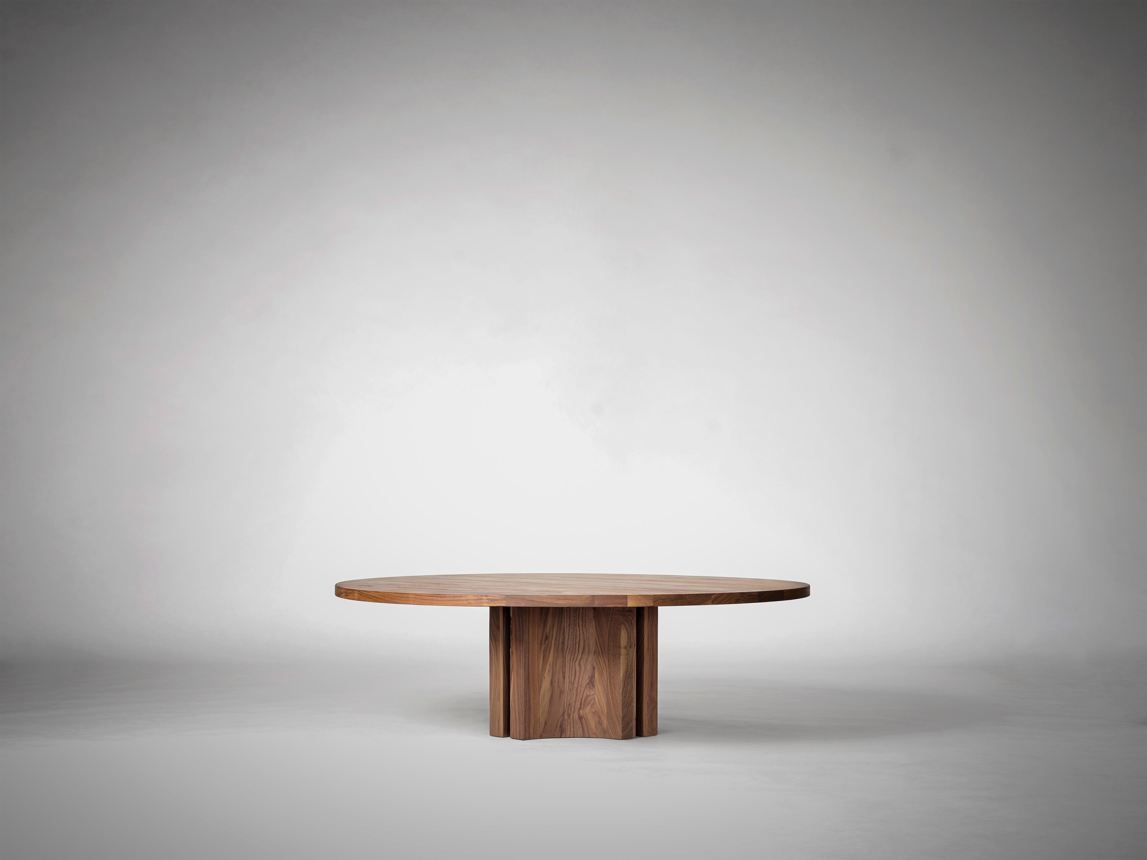https://a.1stdibscdn.com/large-round-coffee-table-in-solid-dark-brown-european-oak-aperta-by-mokko-for-sale-picture-6/f_89302/f_478045021764684920698/Mokko_Aperta_Round_Coffee_Table_American_Walnut_G1_photo_by_Thomas_van_Schaik_master.jpg