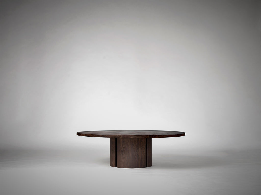 https://a.1stdibscdn.com/round-coffee-table-in-solid-dark-brown-european-oak-aperta-by-mokko-for-sale-picture-2/f_89302/f_464406721756378822446/Mokko_Aperta_Round_Coffee_Table_Dark_Brown_Oak_G1_photo_by_Thomas_van_Schaik_master.jpg