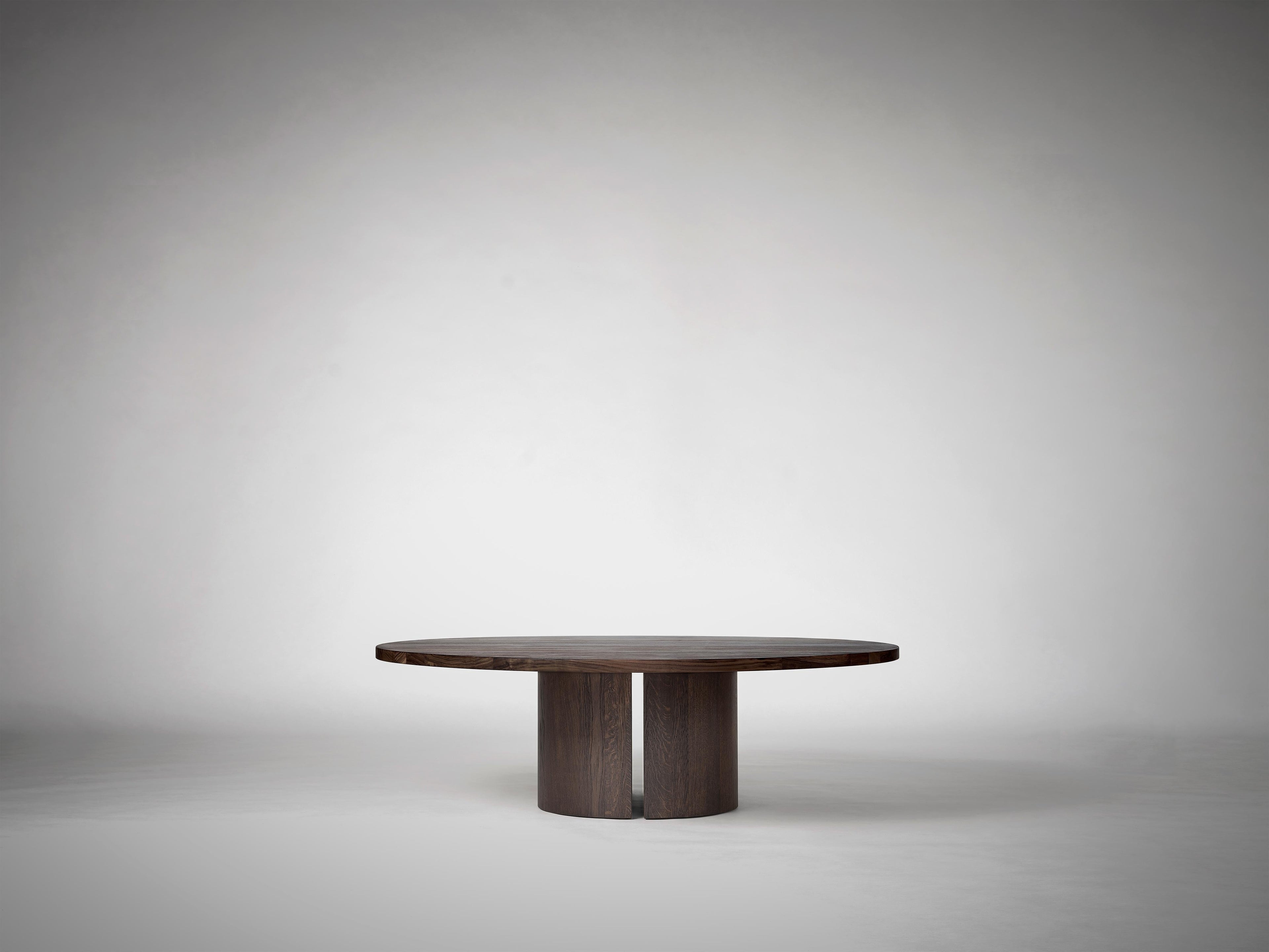 https://a.1stdibscdn.com/large-round-coffee-table-in-solid-dark-brown-european-oak-aperta-by-mokko-for-sale-picture-3/f_89302/f_478045021764684400635/Mokko_Aperta_Round_Coffee_Table_Dark_Brown_Oak_G2_photo_by_Thomas_van_Schaik_master.jpg