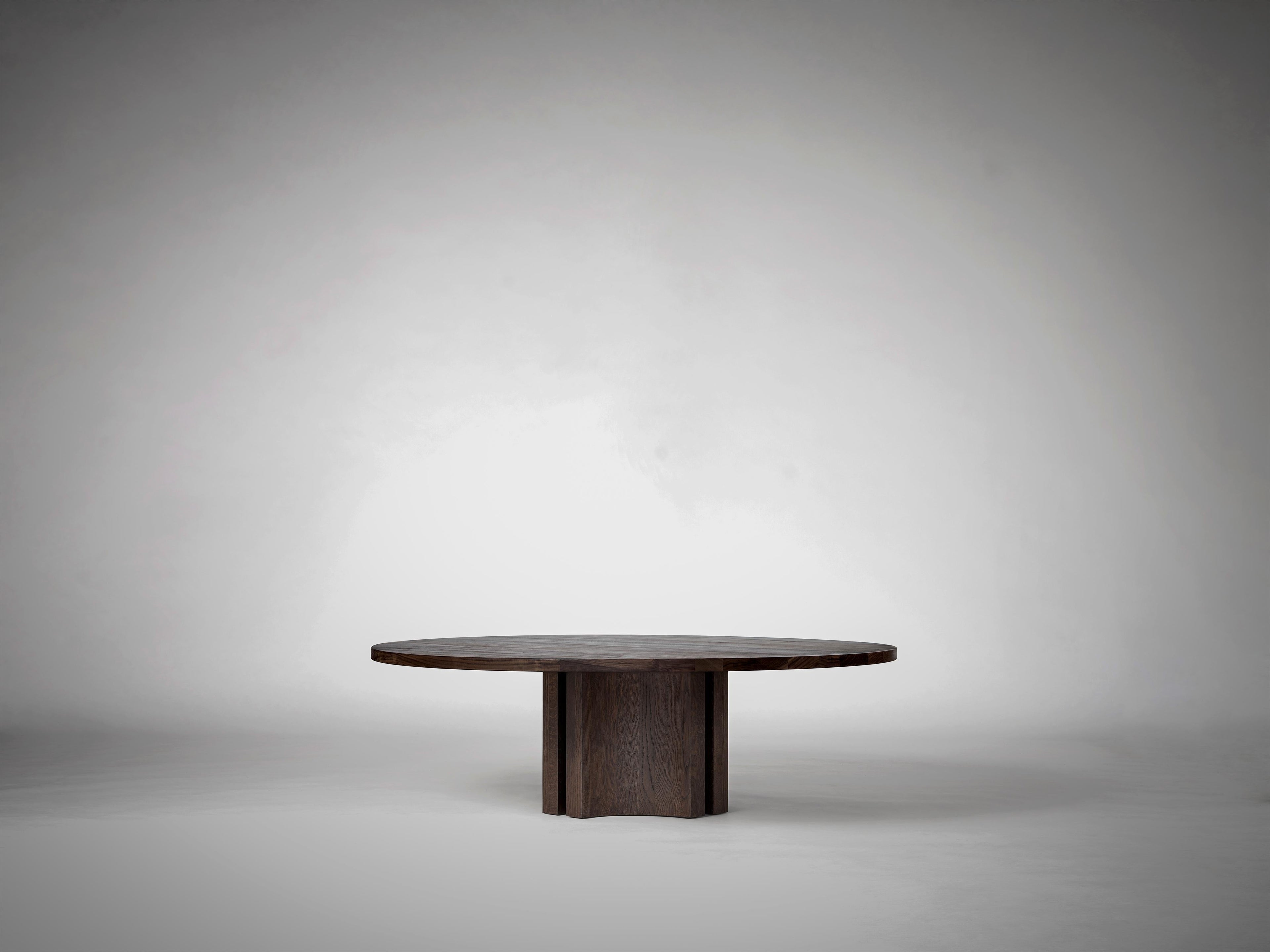 https://a.1stdibscdn.com/round-coffee-table-in-solid-dark-brown-european-oak-aperta-by-mokko-for-sale-picture-4/f_89302/f_464406721756378823723/Mokko_Aperta_Round_Coffee_Table_Dark_Brown_Oak_G4_photo_by_Thomas_van_Schaik_1__master.jpg