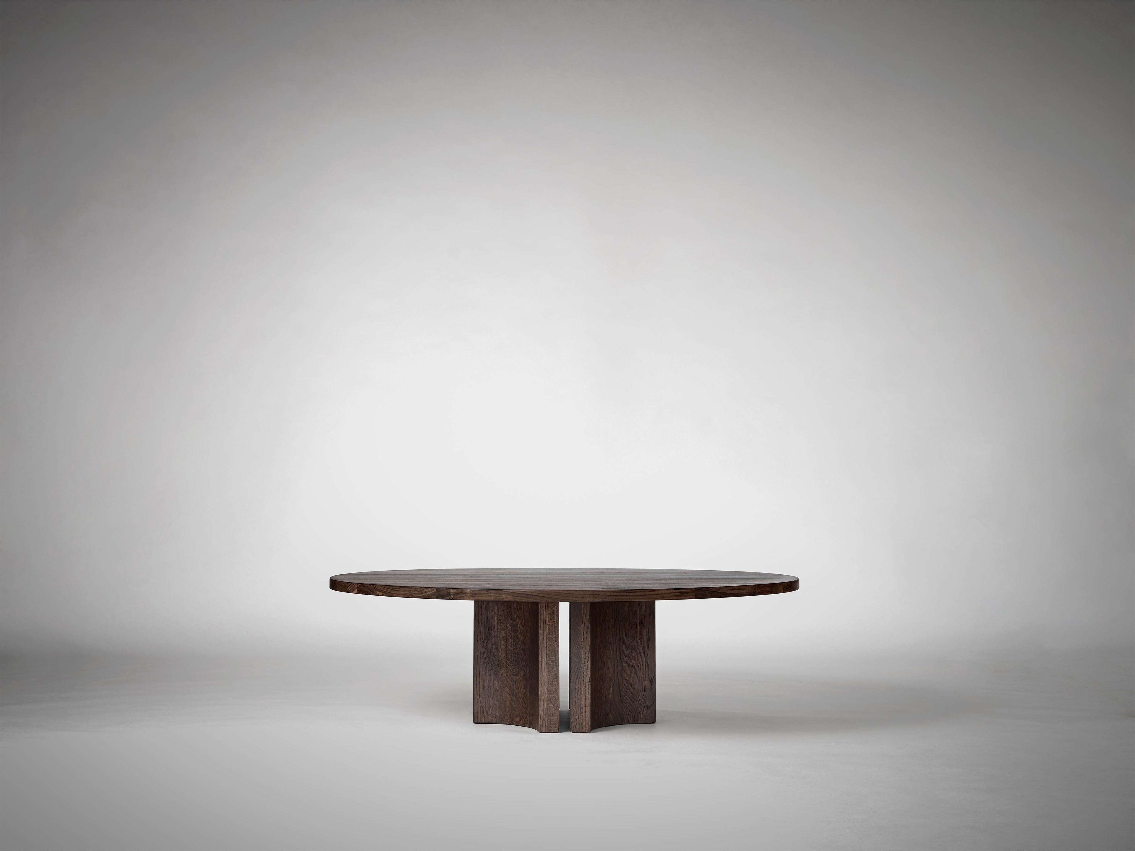 https://a.1stdibscdn.com/round-coffee-table-in-solid-dark-brown-european-oak-aperta-by-mokko-for-sale-picture-5/f_89302/f_464406721756378824111/Mokko_Aperta_Round_Coffee_Table_Dark_Brown_Oak_G4_photo_by_Thomas_van_Schaik_master.jpg