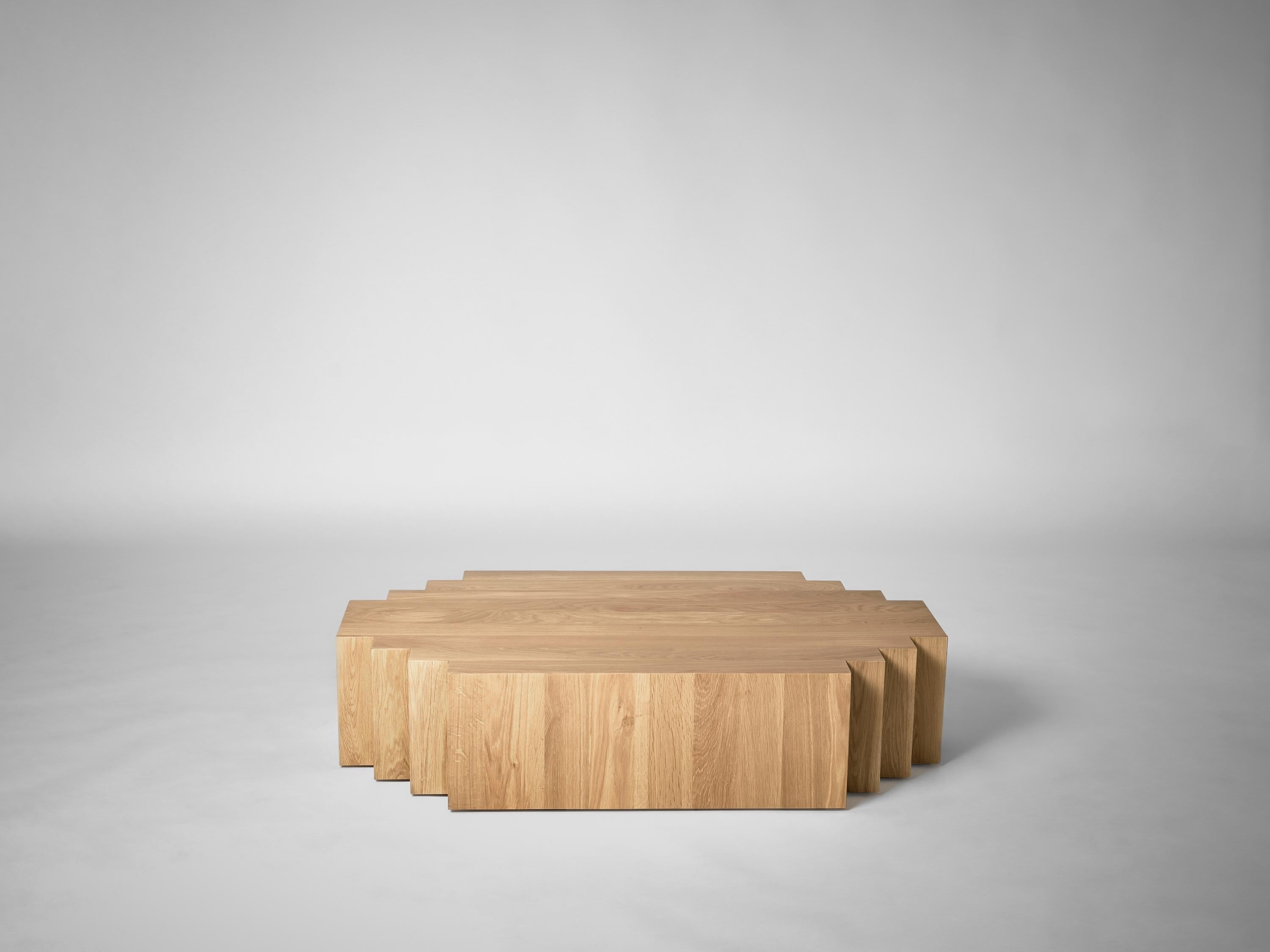 https://a.1stdibscdn.com/brutalist-coffee-table-in-solid-natural-light-oak-brut-by-mokko-for-sale-picture-13/f_89302/f_440812221752578010412/Mokko_Brut_Coffee_Table_Light_Oak_white_side_view_photo_by_Thomas_van_Schaik_master.jpg