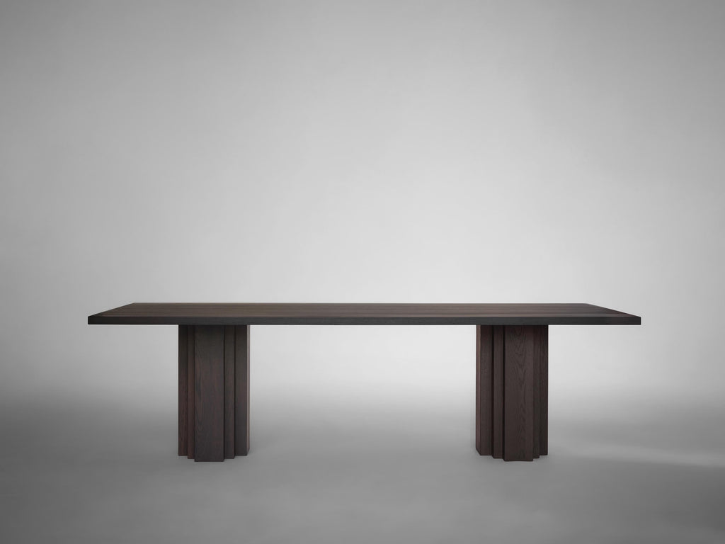 https://a.1stdibscdn.com/large-brutalist-warm-brown-solid-european-oak-table-brut-by-mokko-for-sale-picture-4/f_89302/f_461732221754557900463/Mokko_Brut_table_Dark_Brown_Oak_light_grey_side_view_photo_by_Thomas_van_Schaik_master.jpg