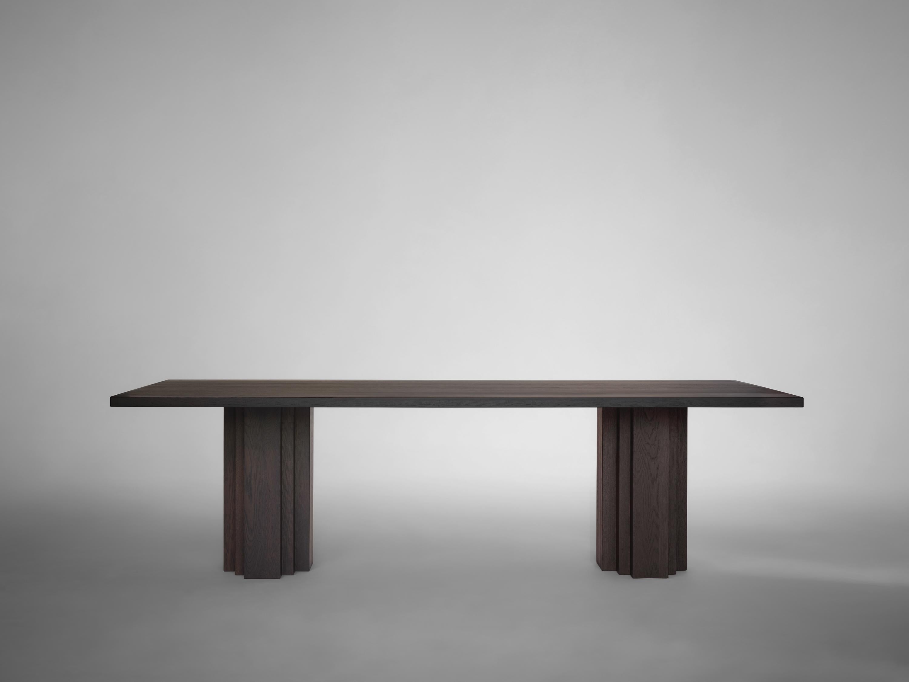 https://a.1stdibscdn.com/large-brutalist-warm-brown-solid-european-oak-table-brut-by-mokko-for-sale-picture-4/f_89302/f_461732221754557900463/Mokko_Brut_table_Dark_Brown_Oak_light_grey_side_view_photo_by_Thomas_van_Schaik_master.jpg