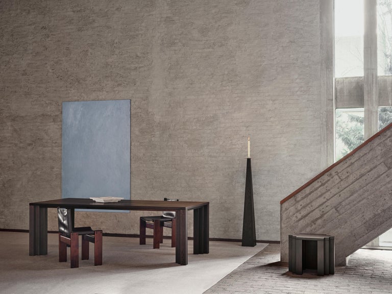 https://a.1stdibscdn.com/large-brutalist-table-in-solid-dark-brown-french-oak-cadence-by-mokko-for-sale-picture-6/f_89302/f_438919721753693555245/Mokko_Cadence_Table_Cadence_Stool_Taes_Candle_Holder_Thomaskerk_photo_by_Thomas_van_Schaik_master.jpg?width=768