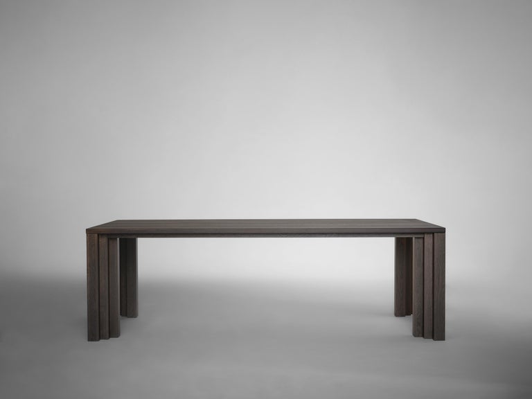 https://a.1stdibscdn.com/large-brutalist-table-in-solid-dark-brown-french-oak-cadence-by-mokko-for-sale-picture-16/f_89302/f_438919721753691713316/Mokko_Cadence_Table_Dark_Brown_Oak_lg_front_design_by_Aad_Bos_master.jpg?width=768