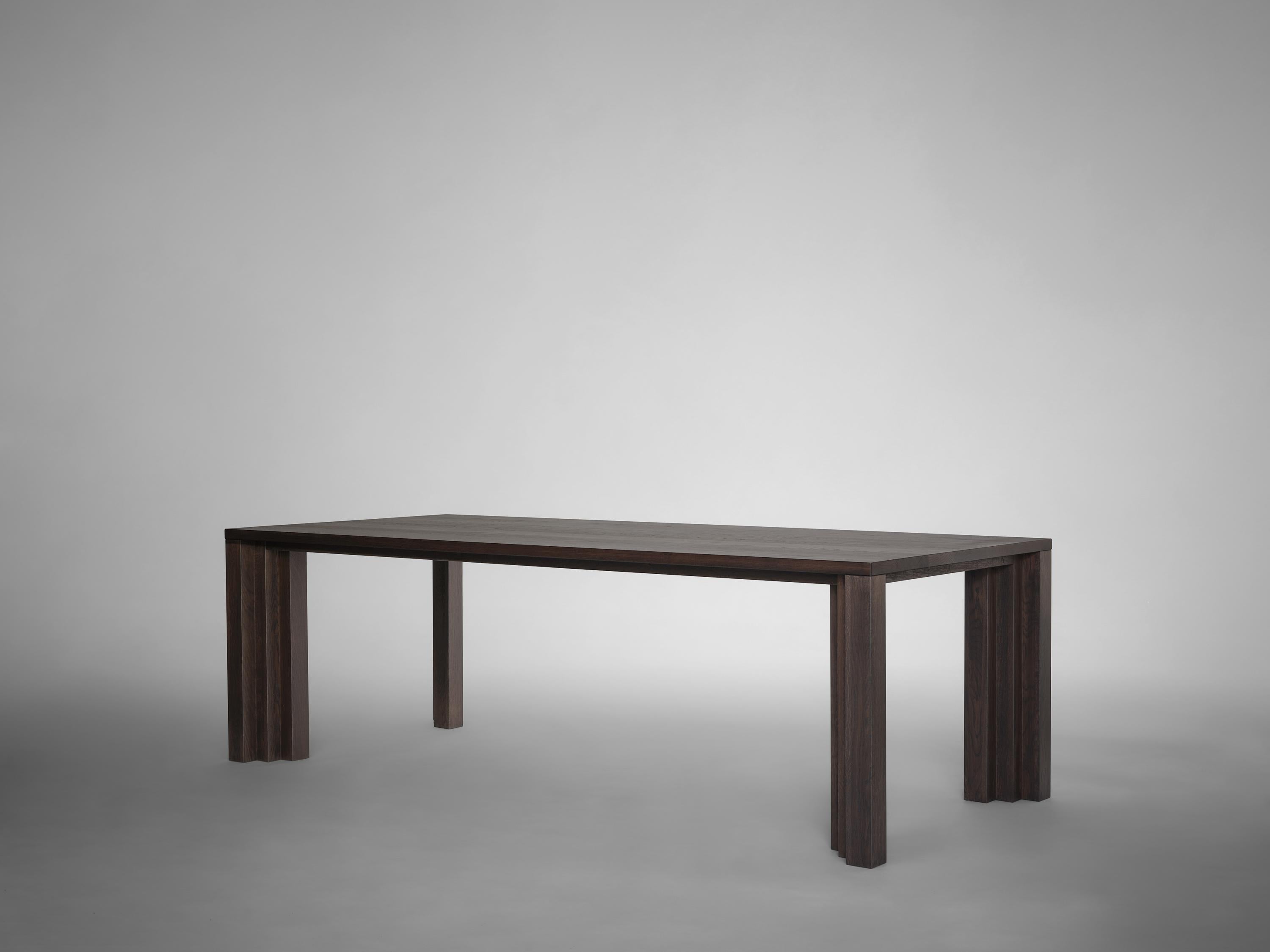 https://a.1stdibscdn.com/large-brutalist-table-solid-european-oak-cadence-by-mokko-for-sale-picture-2/f_89302/f_466166021757580540157/Mokko_Cadence_Table_Dark_Brown_Oak_lg_side_design_by_Aad_Bos_1__master.jpg