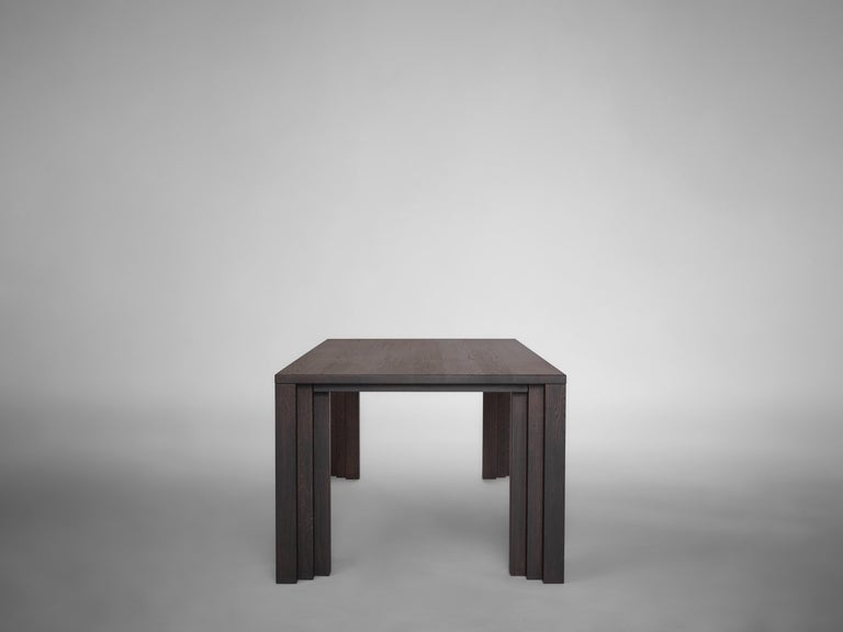 https://a.1stdibscdn.com/large-brutalist-table-in-solid-dark-brown-french-oak-cadence-by-mokko-for-sale-picture-11/f_89302/f_438919721753691711795/Mokko_Cadence_Table_Dark_Brown_Oak_lg_side_design_by_Aad_Bos_master.jpg?width=768