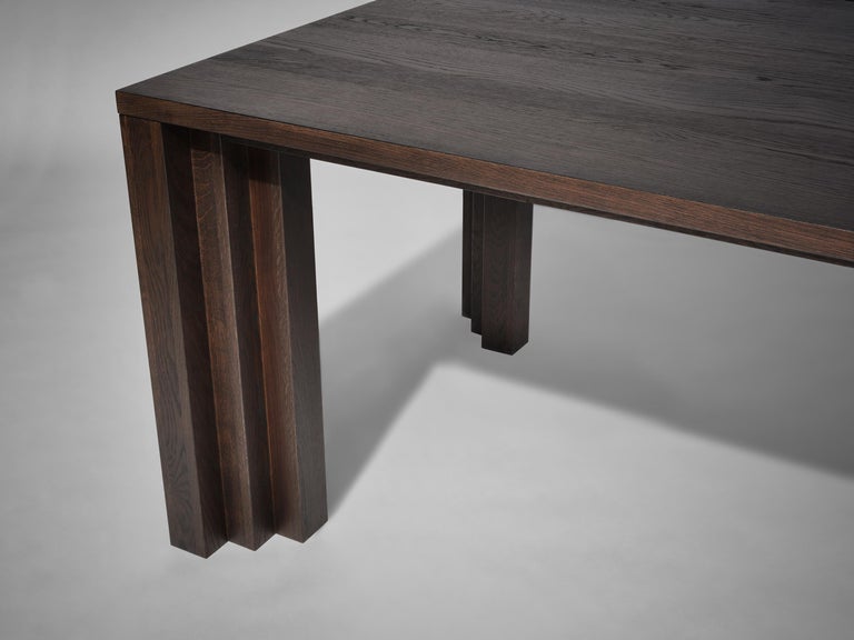 https://a.1stdibscdn.com/large-brutalist-table-in-solid-dark-brown-french-oak-cadence-by-mokko-for-sale-picture-10/f_89302/f_438919721753691712112/Mokko_Cadence_Table_Dark_Brown_Oak_white_detail_design_by_Aad_Bos_master.jpg?width=768