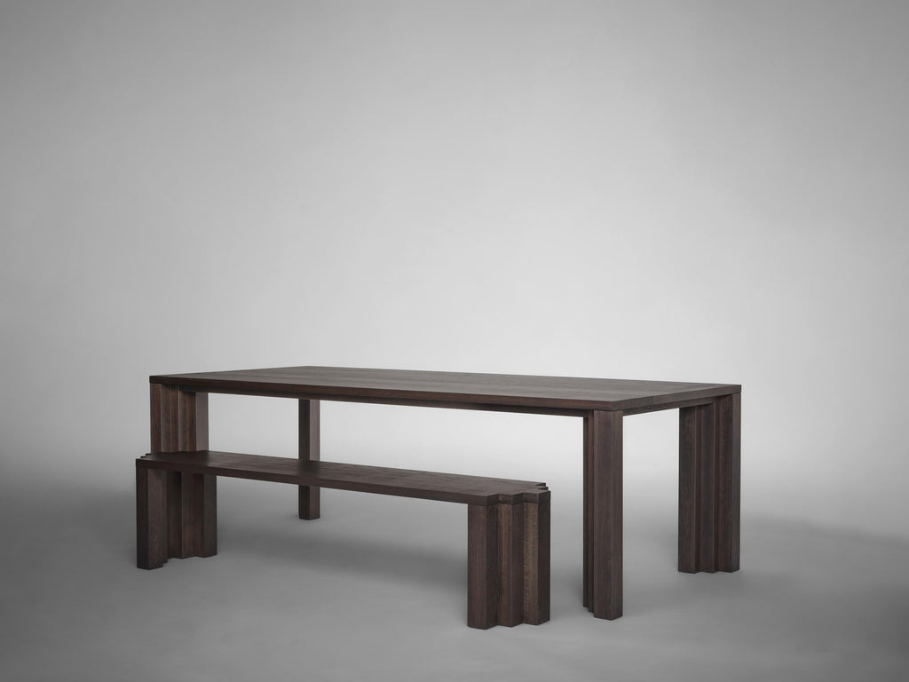 https://a.1stdibscdn.com/large-brutalist-table-solid-european-oak-cadence-by-mokko-for-sale-picture-7/f_89302/f_466166021757580542982/Mokko_Cadence_Table_and_Bench_Dark_Brown_Oak_lg_side_design_by_Aad_Bos_master.jpg