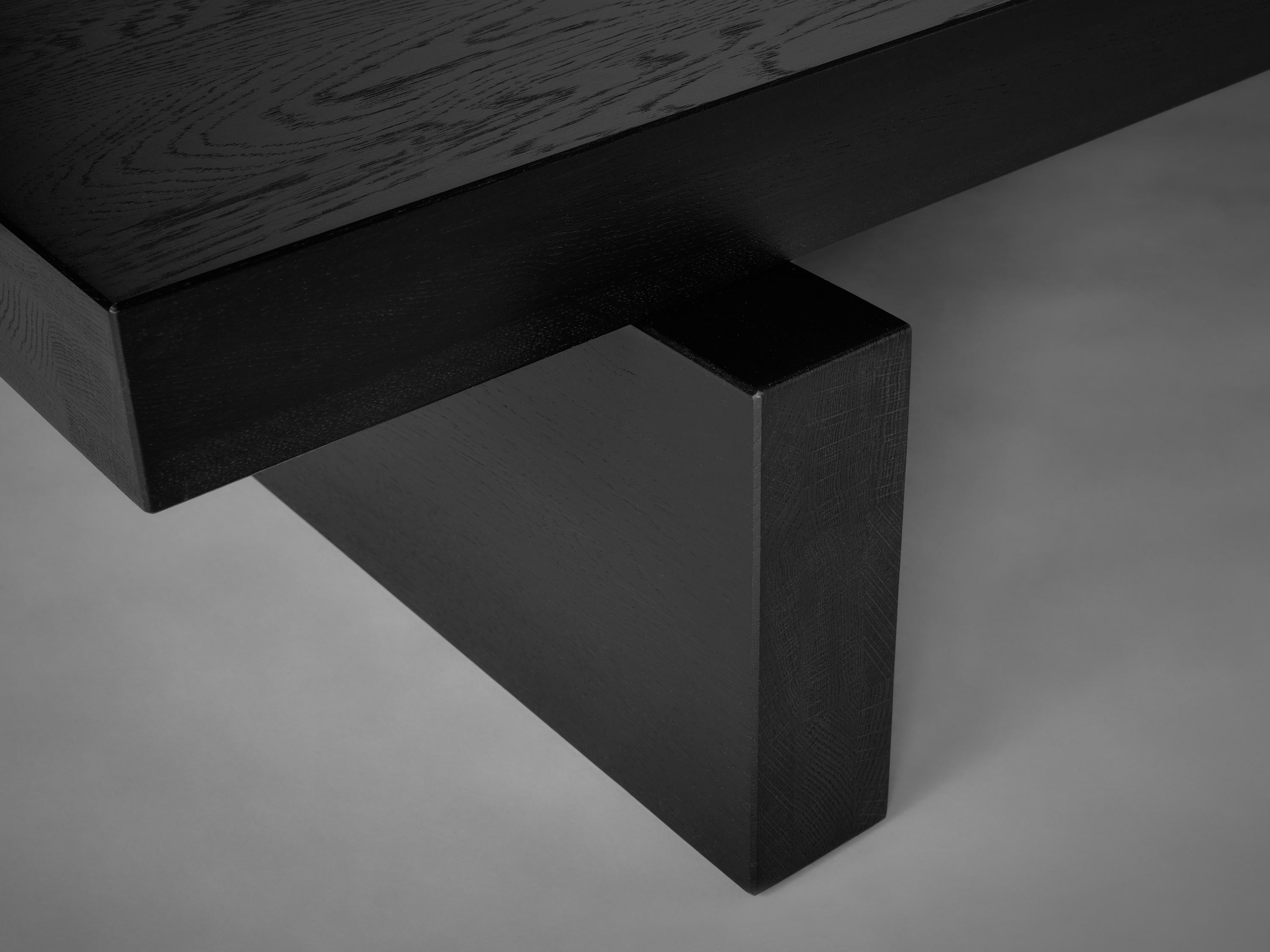 https://a.1stdibscdn.com/brutalist-coffee-table-in-solid-black-european-oak-hari-by-mokko-for-sale-picture-6/f_89302/f_460594521753782530520/Mokko_Hari_Coffee_Table_black_oak_lg_design_by_Aad_Bos_1__master.jpg