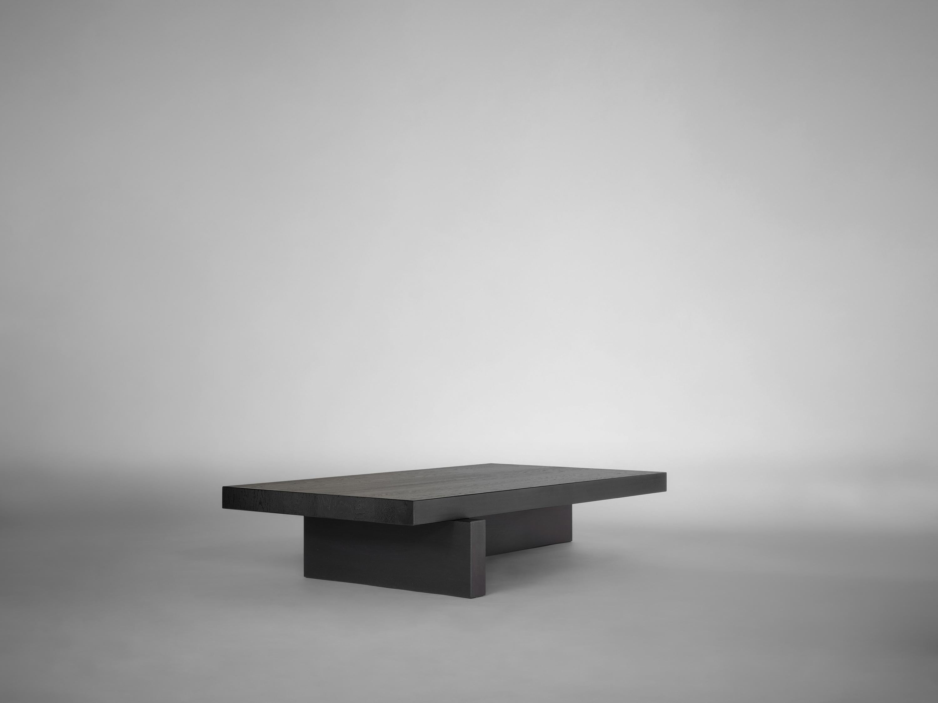 https://a.1stdibscdn.com/brutalist-coffee-table-in-solid-black-european-oak-hari-by-mokko-for-sale-picture-3/f_89302/f_460594521753784121438/Mokko_Hari_Coffee_Table_black_oak_lg_design_by_Aad_Bos_2__master.jpg