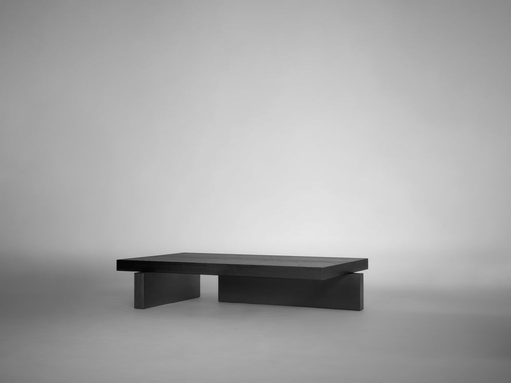 https://a.1stdibscdn.com/brutalist-coffee-table-in-solid-black-european-oak-hari-by-mokko-for-sale-picture-2/f_89302/f_460594521753782530098/Mokko_Hari_Coffee_Table_black_oak_lg_design_by_Aad_Bos_master.jpg