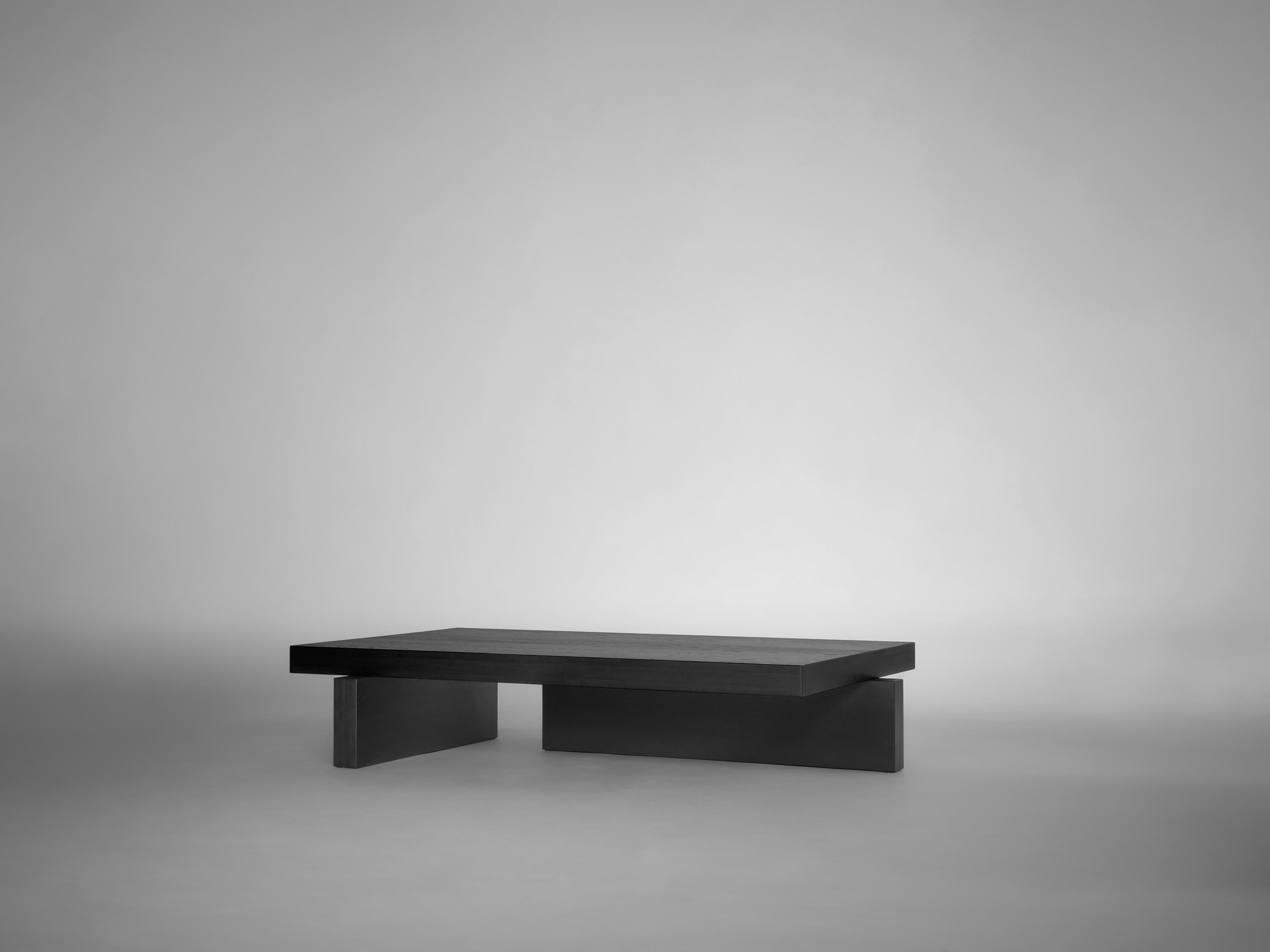https://a.1stdibscdn.com/brutalist-coffee-table-in-solid-black-european-oak-hari-by-mokko-for-sale-picture-2/f_89302/f_460594521753782530098/Mokko_Hari_Coffee_Table_black_oak_lg_design_by_Aad_Bos_master.jpg