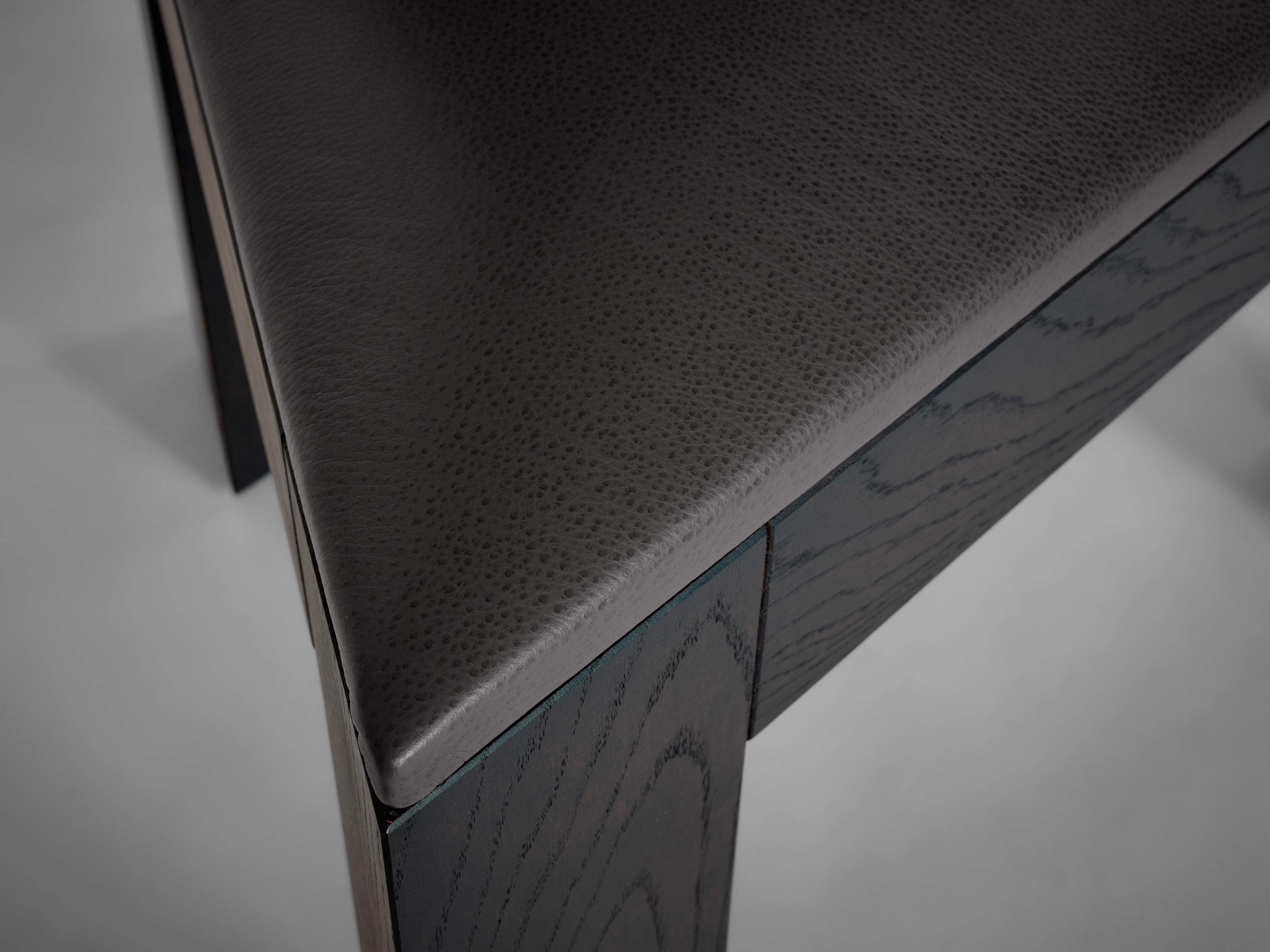 https://a.1stdibscdn.com/brutalist-solid-dark-brown-oak-trigon-chair-for-sale-picture-8/f_89302/f_461450021754384755978/Mokko_Trigon_Chair_Dark_Brown_Oak_grey_seating_lg_detail_design_by_Aad_Bos_master.jpg