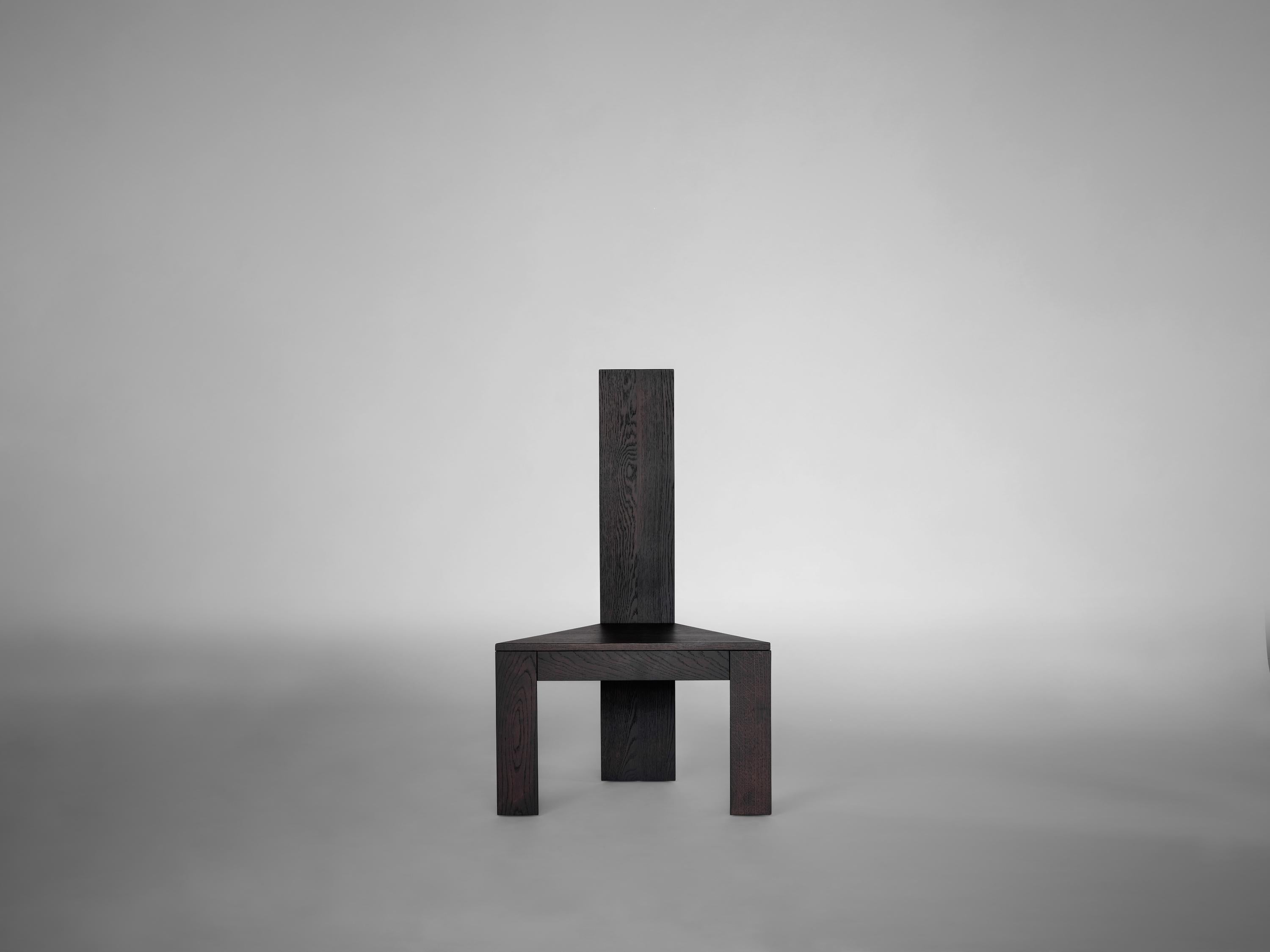 https://a.1stdibscdn.com/brutalist-solid-dark-brown-oak-trigon-chair-for-sale-picture-4/f_89302/f_461450021754384755617/Mokko_Trigon_Chair_Dark_Brown_Oak_lg_front_design_by_Aad_Bos_master.jpg