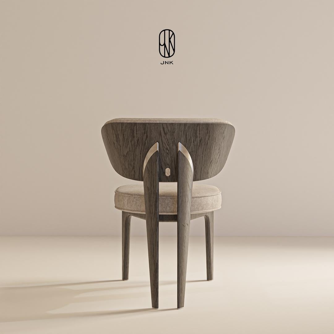 https://a.1stdibscdn.com/modern-mone-chair-by-jnk-for-sale-picture-5/f_93551/f_402954521719083446253/Mone_Chair_1_4_master.jpg