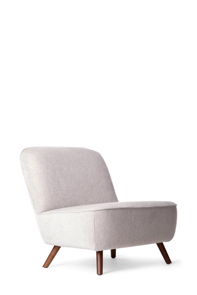 https://a.1stdibscdn.com/moooi-cocktail-chair-in-liscio-nebbia-upholstery-cinnamon-stained-legs-for-sale-picture-2/22569652/f_271086121643351994466/Moooi_Cocktail_Chair_in_Liscio_Nebbia_Upholstery_Cinnamon_Stained_Legs_master.jpg?width=768