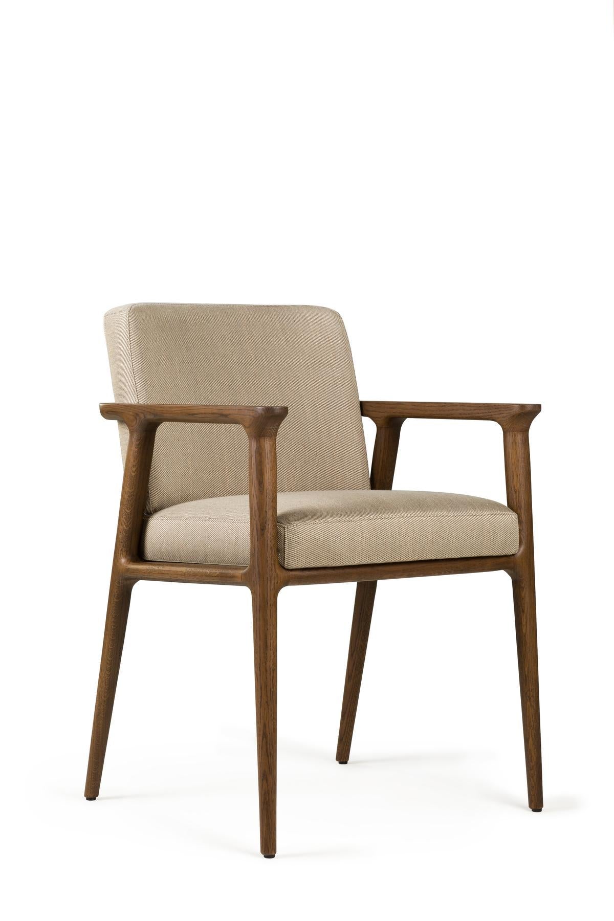 https://a.1stdibscdn.com/moooi-zio-dining-chair-in-oray-ronan-upholstery-with-oak-stained-cinnamon-frame-for-sale-picture-2/22569652/f_271135721643370689323/Moooi_Zio_Dining_Chair_in_Oray_Ronan_Upholstery_with_Oak_Stained_Cinnamon_Frame_2_master.jpg