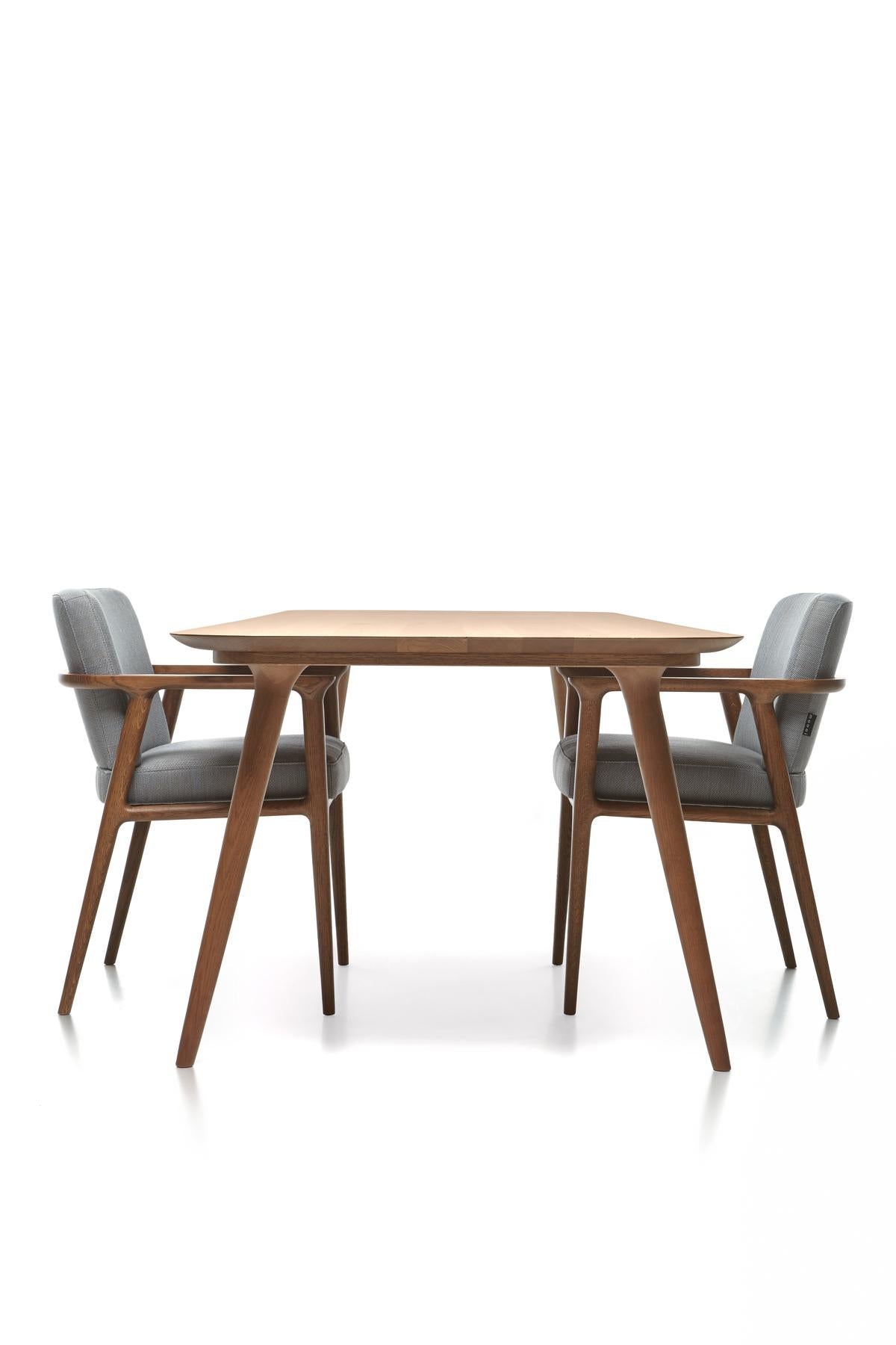 https://a.1stdibscdn.com/moooi-zio-dining-chair-in-oray-ronan-upholstery-with-oak-stained-cinnamon-frame-for-sale-picture-6/22569652/f_271135721643370704445/Moooi_Zio_Dining_Chair_in_Oray_Ronan_Upholstery_with_Oak_Stained_Cinnamon_Frame_6_master.jpg