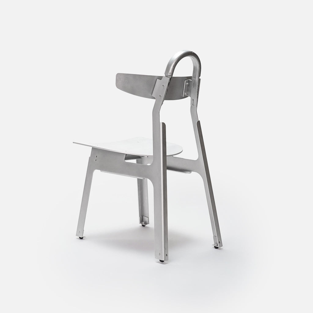 https://a.1stdibscdn.com/metal-moto-chair-in-brake-formed-sand-cast-aluminum-by-medium-small-for-sale-picture-8/f_12192/f_491949921773332293285/Moto_Metal_RearOblique_master.jpg