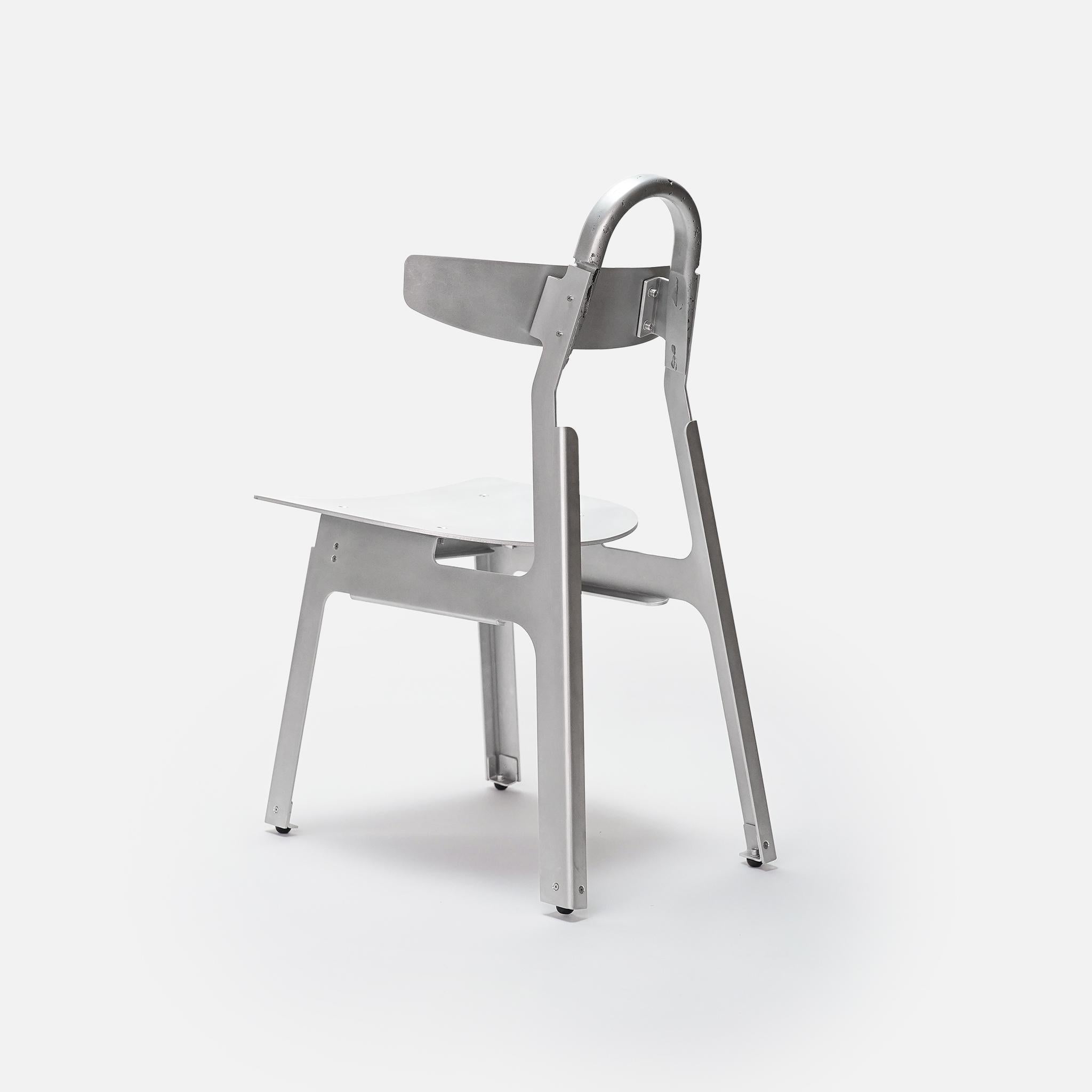 https://a.1stdibscdn.com/metal-moto-chair-in-brake-formed-sand-cast-aluminum-by-medium-small-for-sale-picture-8/f_12192/f_491949921773332293285/Moto_Metal_RearOblique_master.jpg