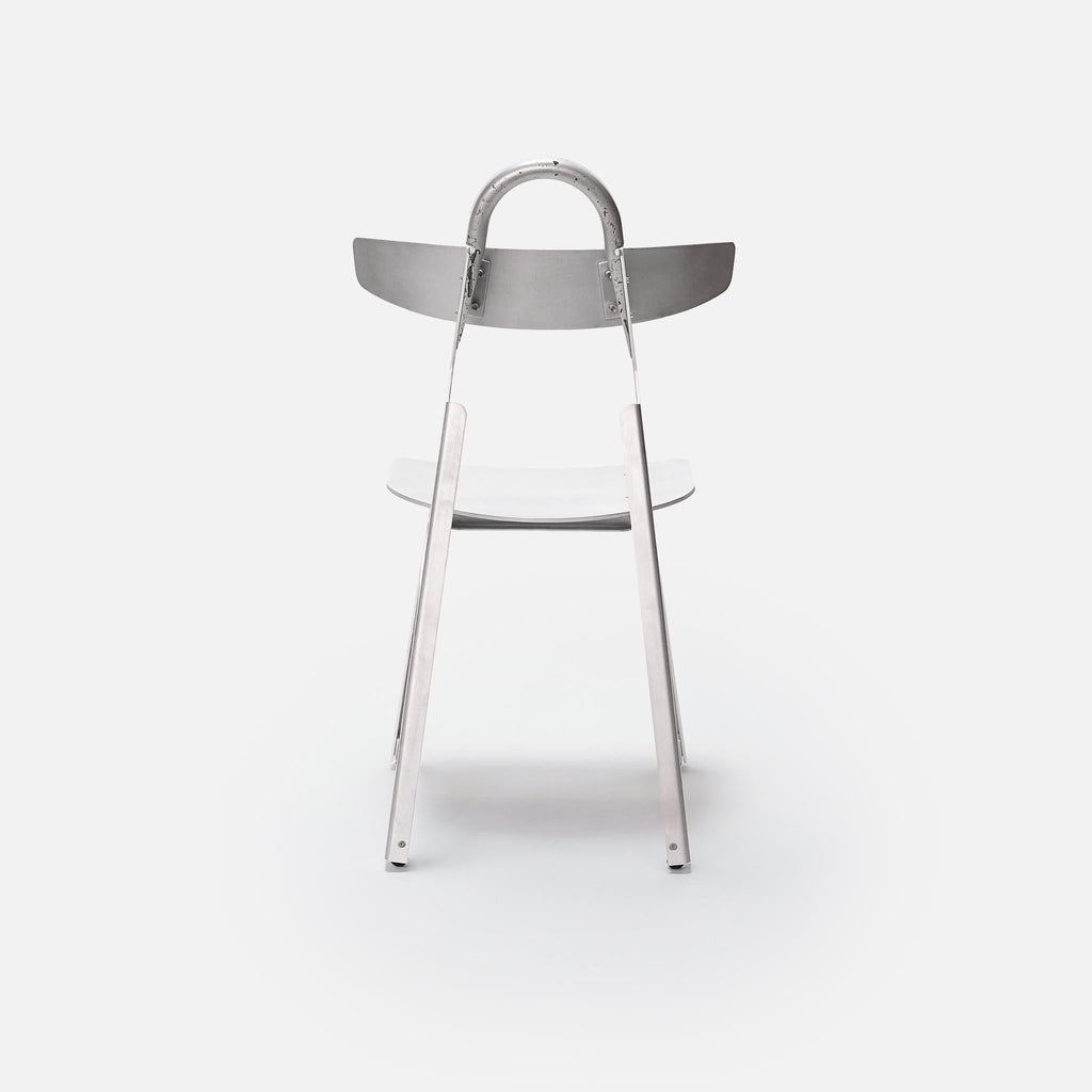 https://a.1stdibscdn.com/metal-moto-chair-in-brake-formed-sand-cast-aluminum-by-medium-small-for-sale-picture-7/f_12192/f_491949921773332293829/Moto_Metal_Rear_master.jpg