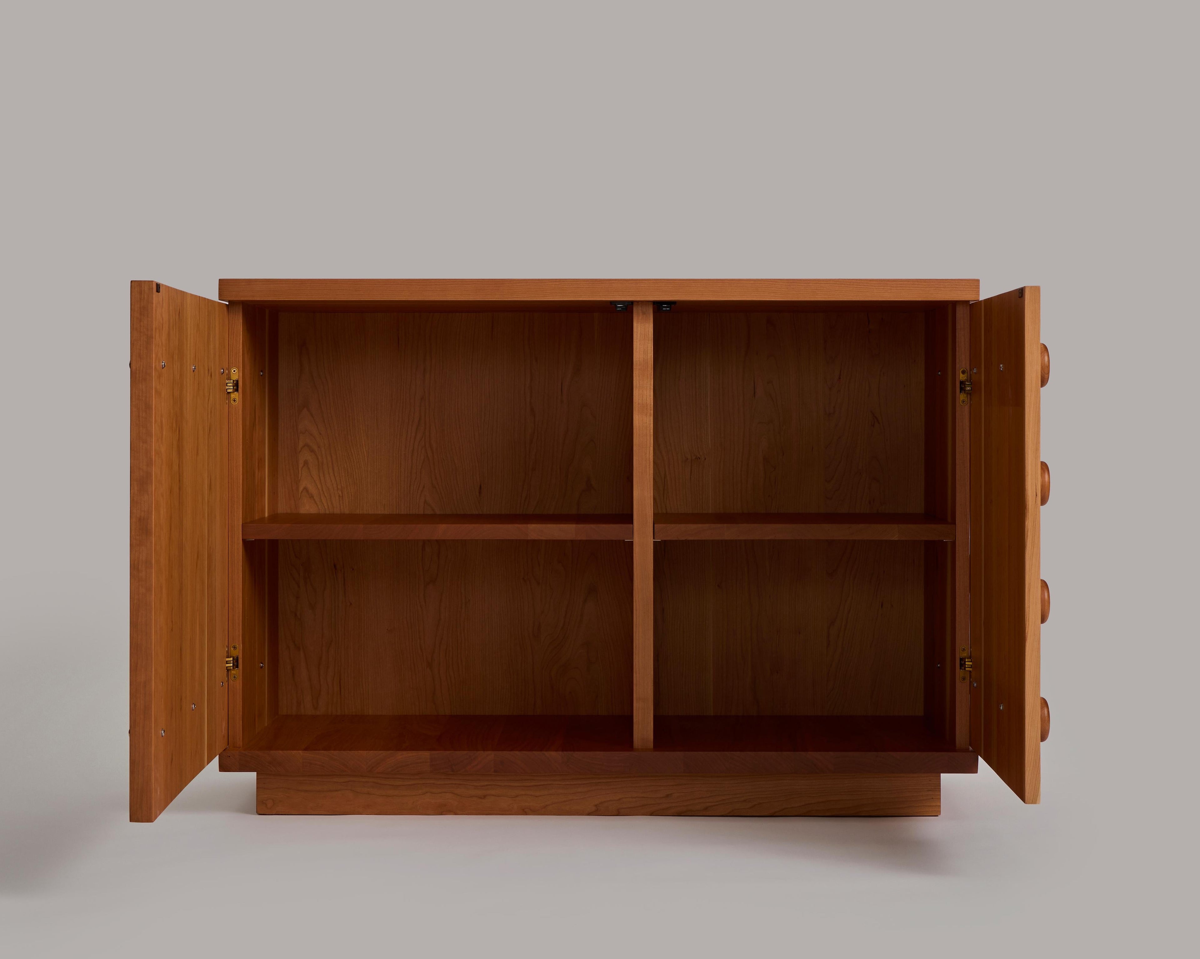 https://a.1stdibscdn.com/futuristic-cherry-sideboard-or-cabinet-by-muhly-with-cast-iron-knobs-for-sale-picture-4/f_37133/f_462548221755098383006/Muhly_Console_open_master.jpg