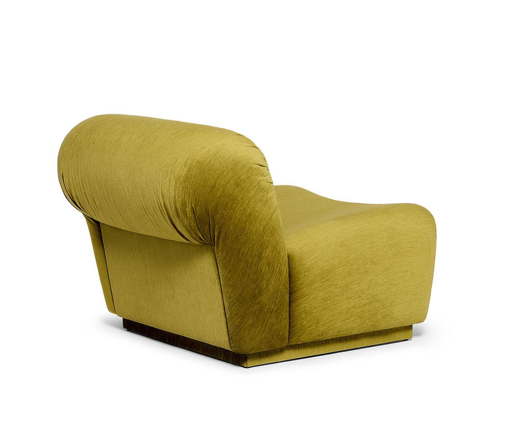 https://a.1stdibscdn.com/retro-style-armchair-with-curved-form-and-pleated-details-for-sale-picture-5/f_27693/f_397508621715879182969/Munna_Camille_4_master.jpg