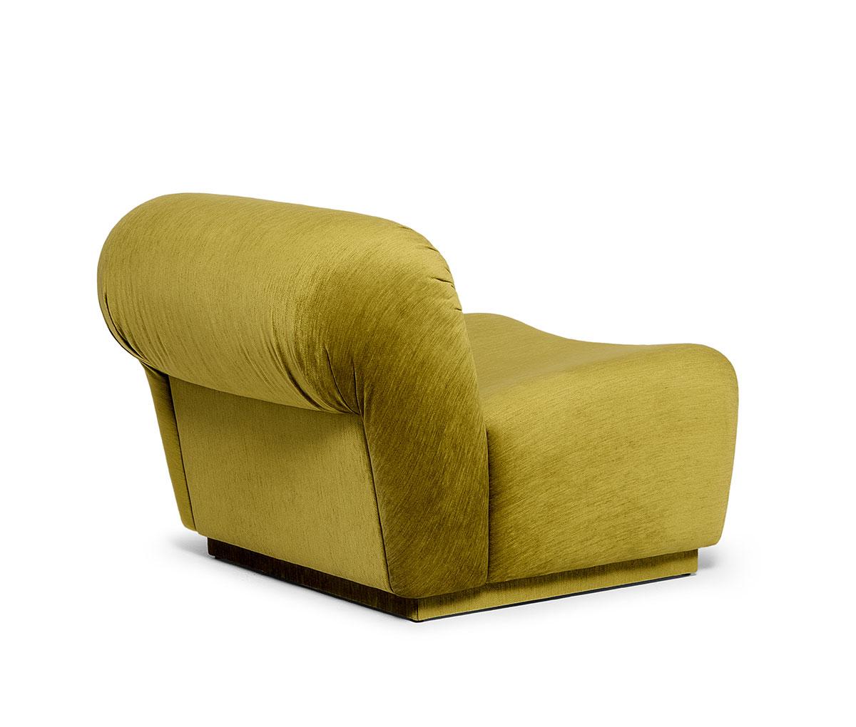 https://a.1stdibscdn.com/retro-style-armchair-with-curved-form-and-pleated-details-for-sale-picture-5/f_27693/f_397508621715879182969/Munna_Camille_4_master.jpg