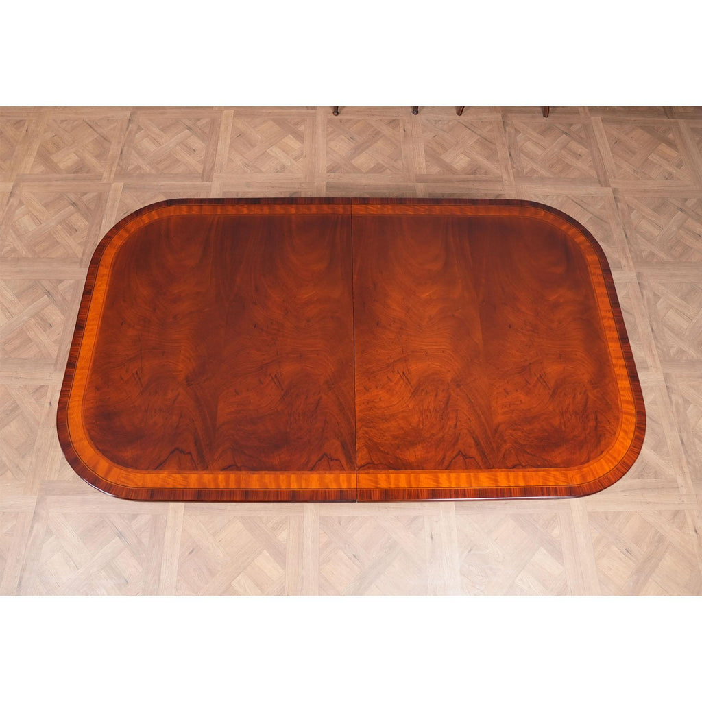 https://a.1stdibscdn.com/banded-mahogany-dining-table-for-sale-picture-5/f_85472/f_350139721741119205270/NDRT030_4_master.jpg