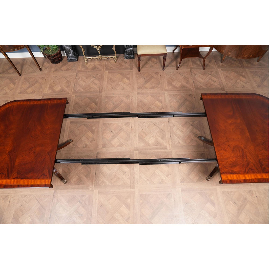 https://a.1stdibscdn.com/banded-mahogany-dining-table-for-sale-picture-6/f_85472/f_350139721741119205305/NDRT030_5_master.jpg