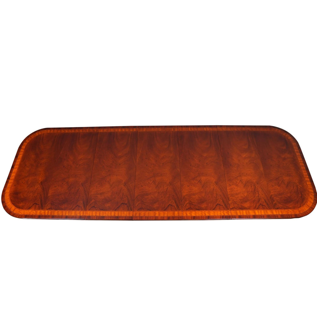 https://a.1stdibscdn.com/banded-mahogany-dining-table-for-sale-picture-9/f_85472/f_350139721741119206942/NDRT030_master.jpg