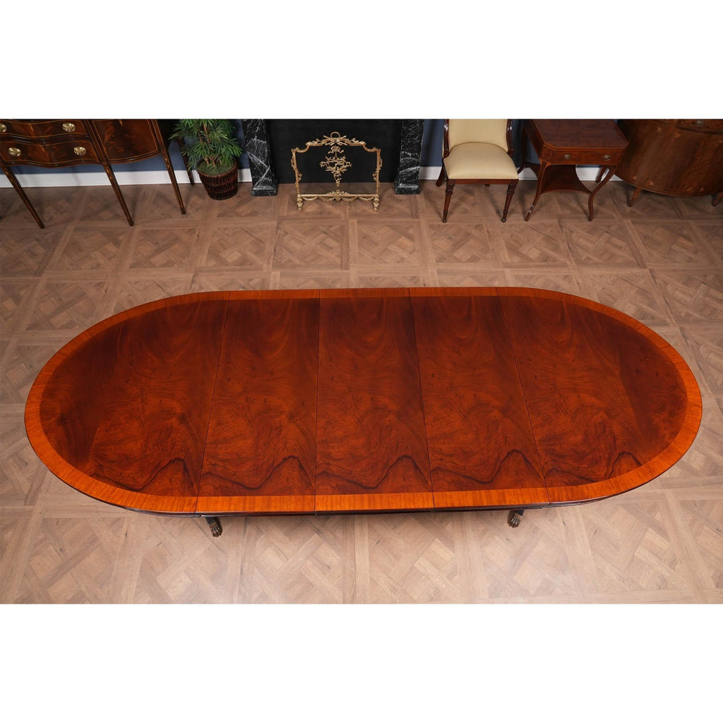 https://a.1stdibscdn.com/long-oval-mahogany-dining-table-for-sale-picture-10/f_85472/f_350306521741116698739/NDRT045_9_master.jpg