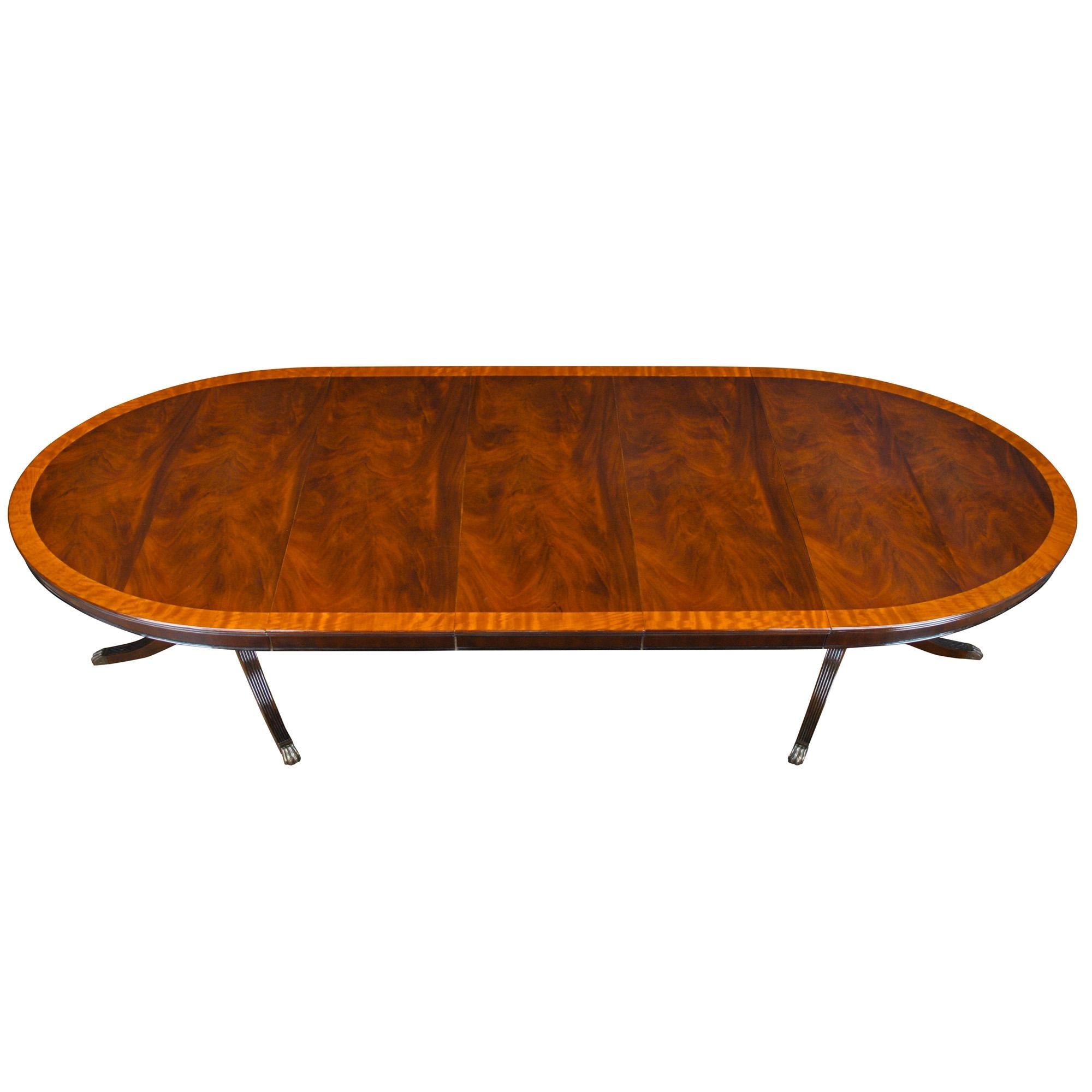 https://a.1stdibscdn.com/long-oval-mahogany-dining-table-for-sale-picture-11/f_85472/f_350306521741116698835/NDRT045_master.jpg