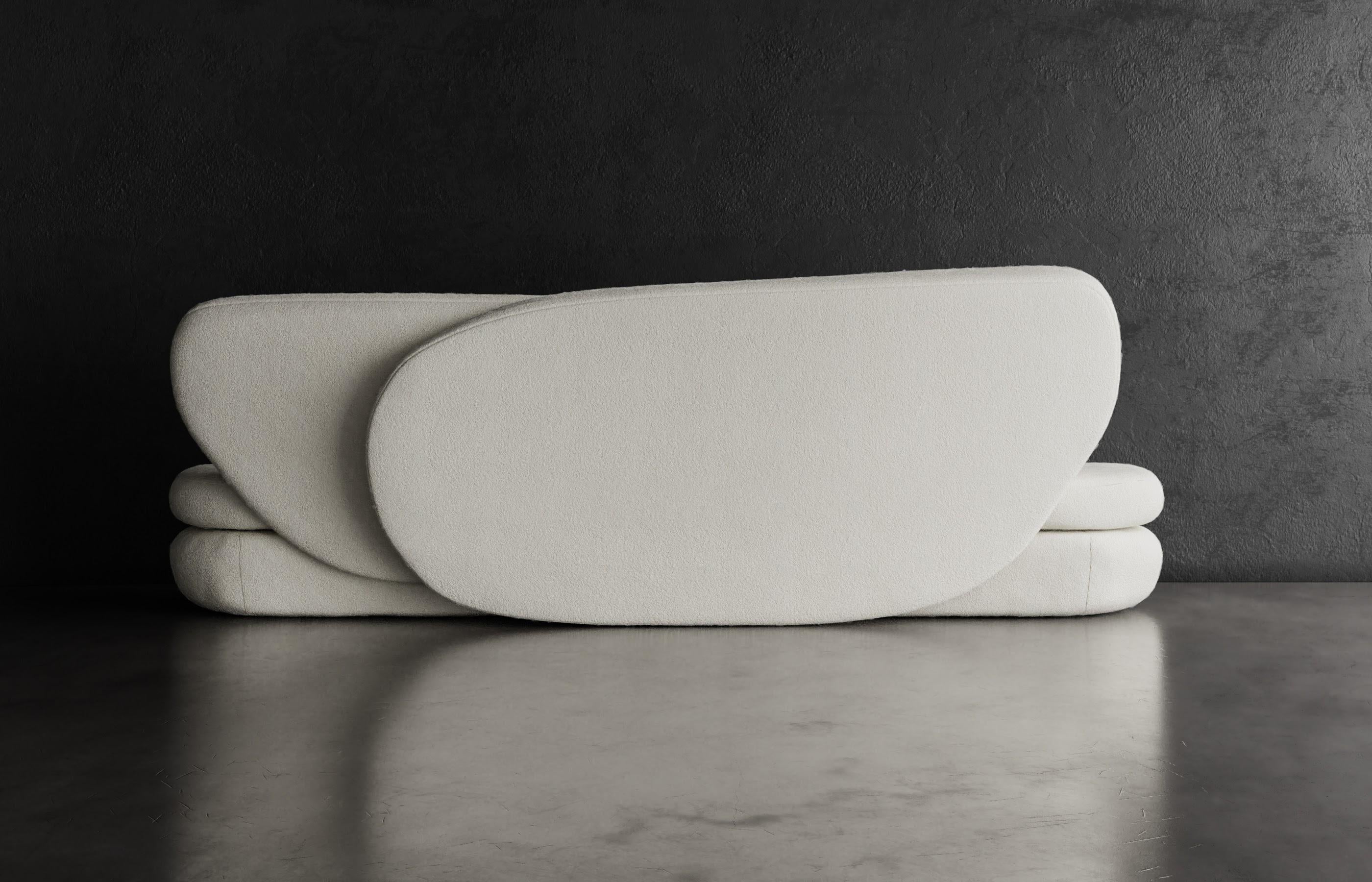 https://a.1stdibscdn.com/curve-sofa-modern-layered-asymmetrical-sofa-in-cream-boucle-for-sale-picture-4/f_33283/f_241047321623279674876/NEW_CURVE_SOFA0004_master.jpg
