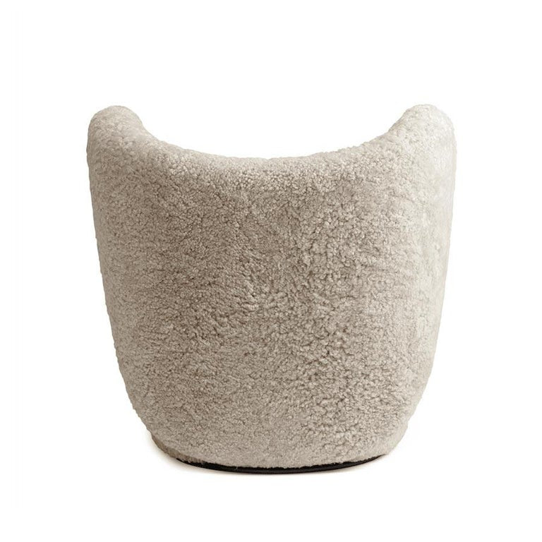 https://a.1stdibscdn.com/little-big-chair-swivel-armchair-in-sheepskin-moonlight-by-norr11-for-sale-picture-7/f_31233/f_334393721679568154022/NORR11Little_Big_ChairSheepskin_Moonlight_Back_master.jpg?width=768